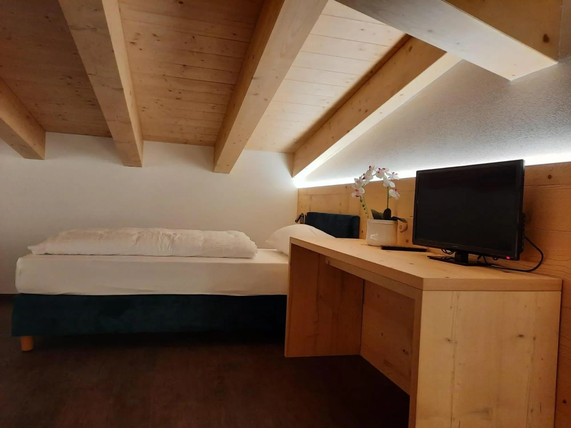 Bed in Alpen Hotel Vidi