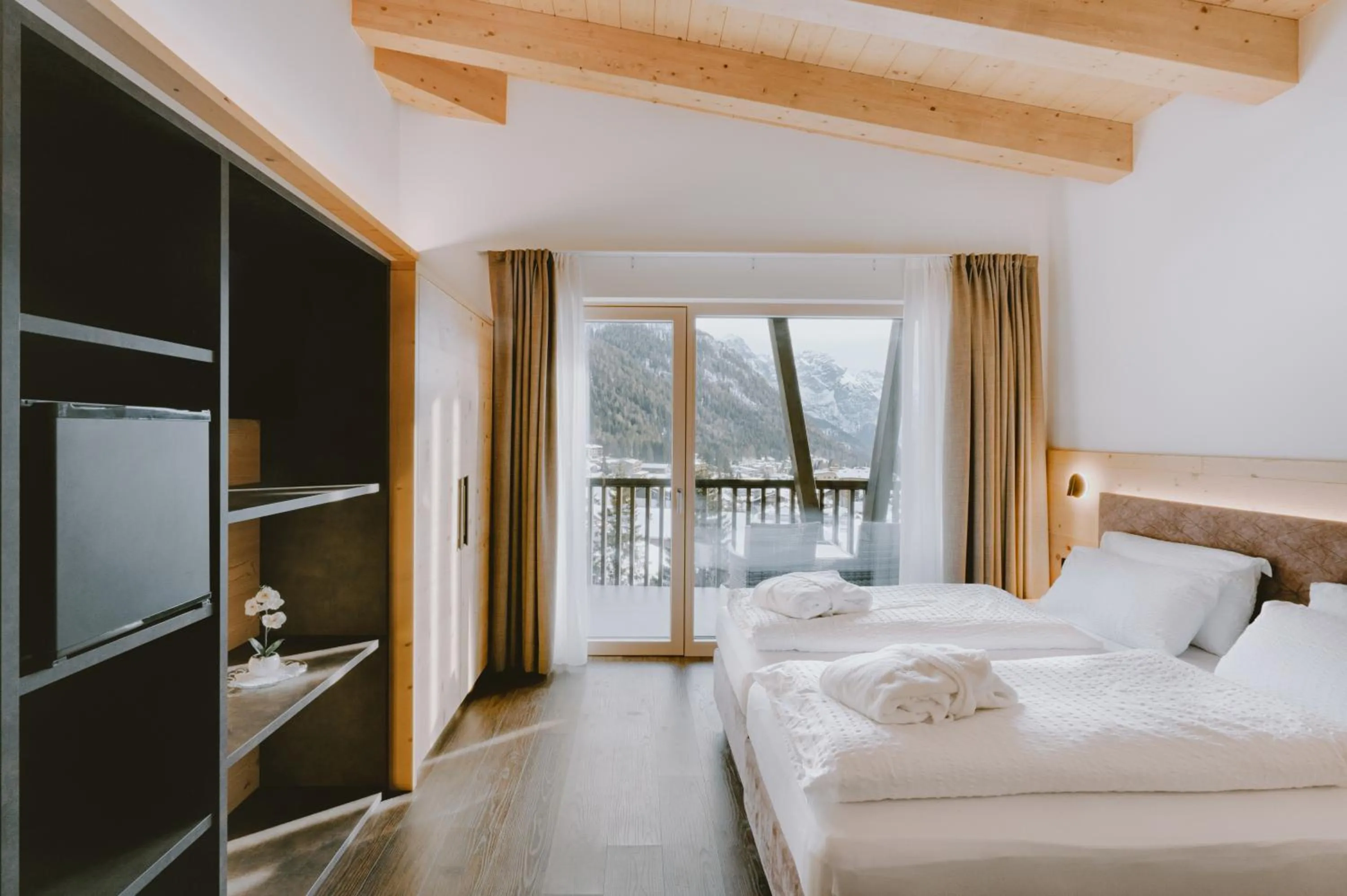 Bed in Alpen Hotel Vidi