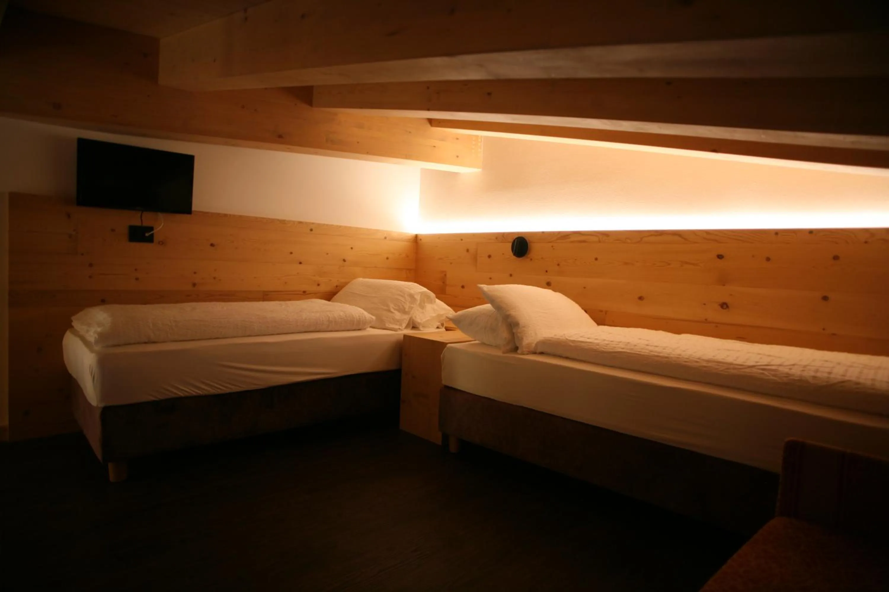 Bed in Alpen Hotel Vidi