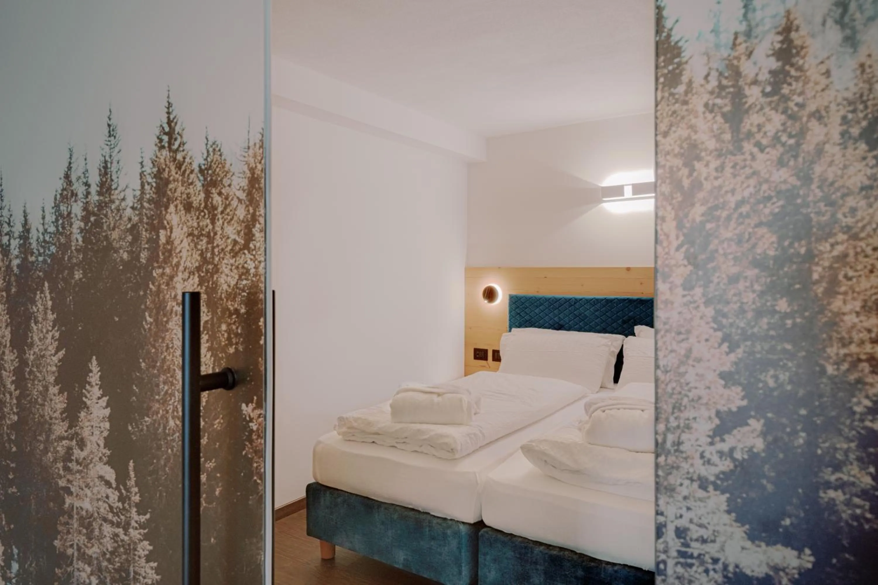 Bed in Alpen Hotel Vidi