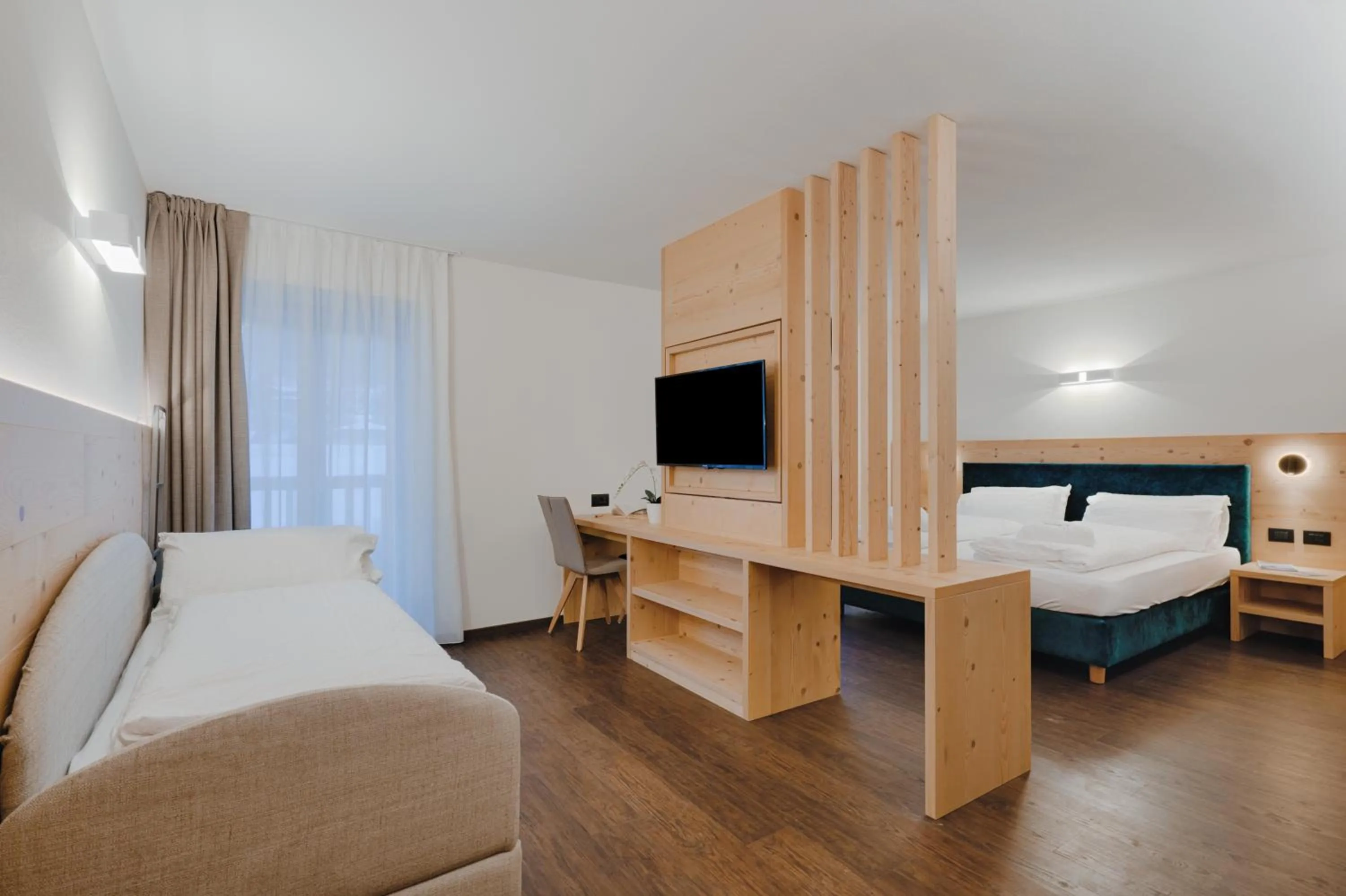 Bed in Alpen Hotel Vidi