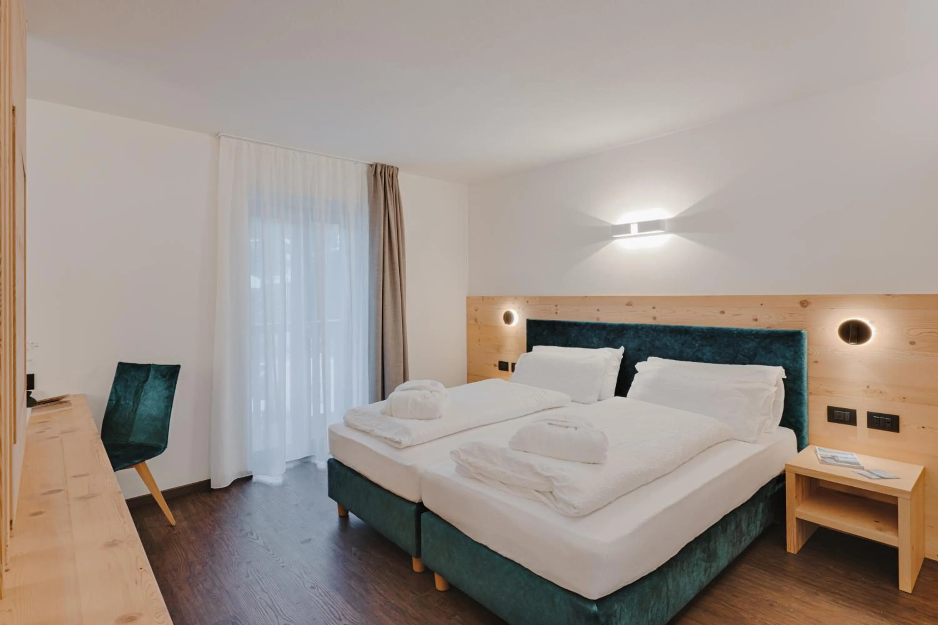 Bed in Alpen Hotel Vidi