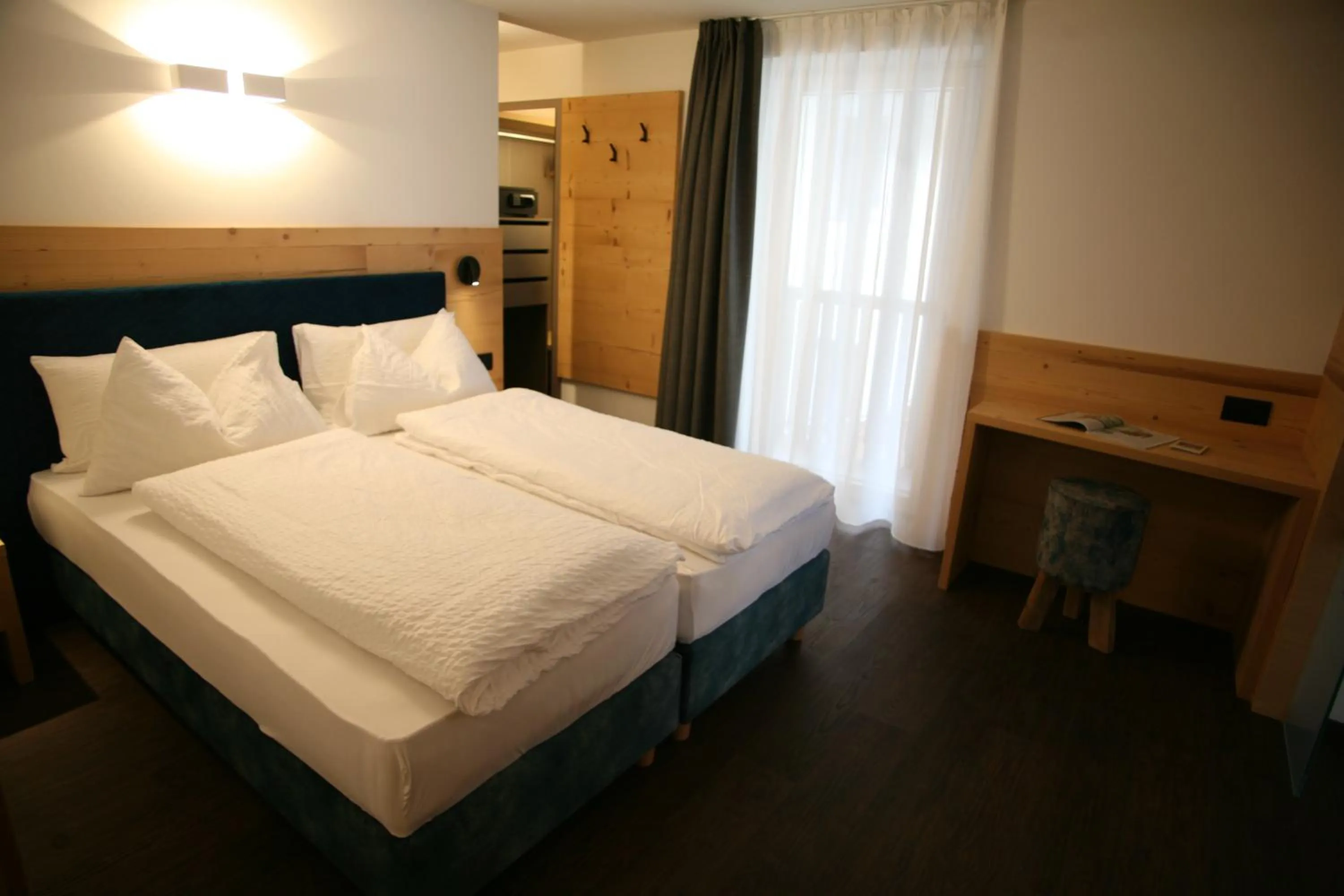 Bed in Alpen Hotel Vidi