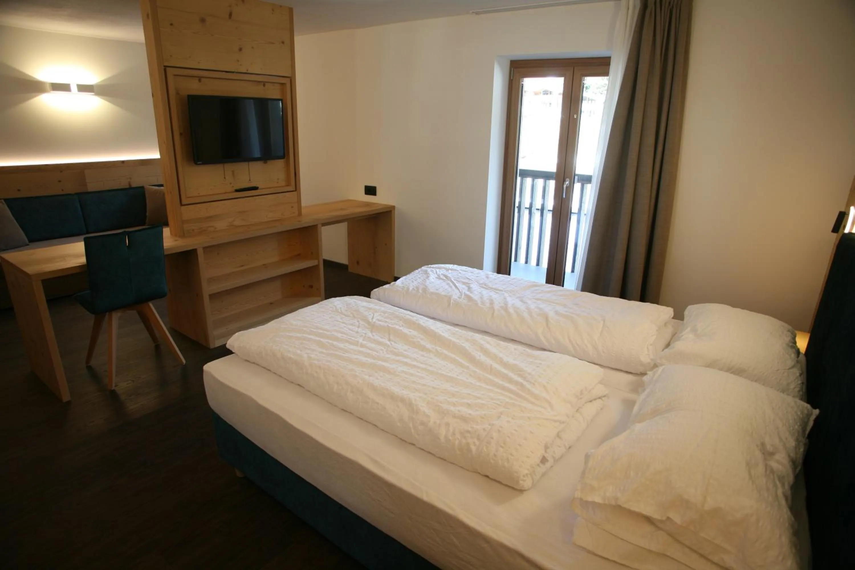 Bed in Alpen Hotel Vidi