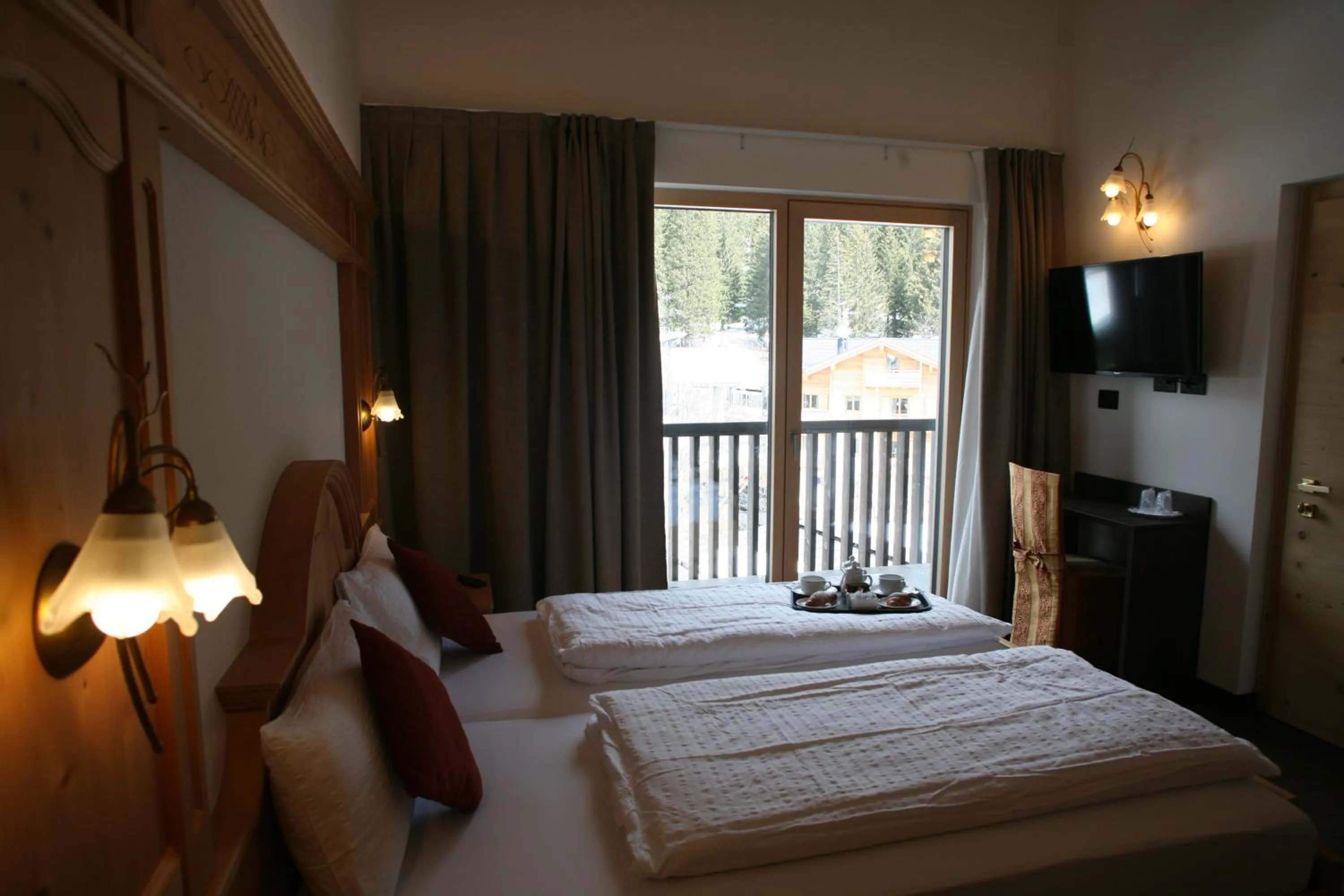 Bed in Alpen Hotel Vidi