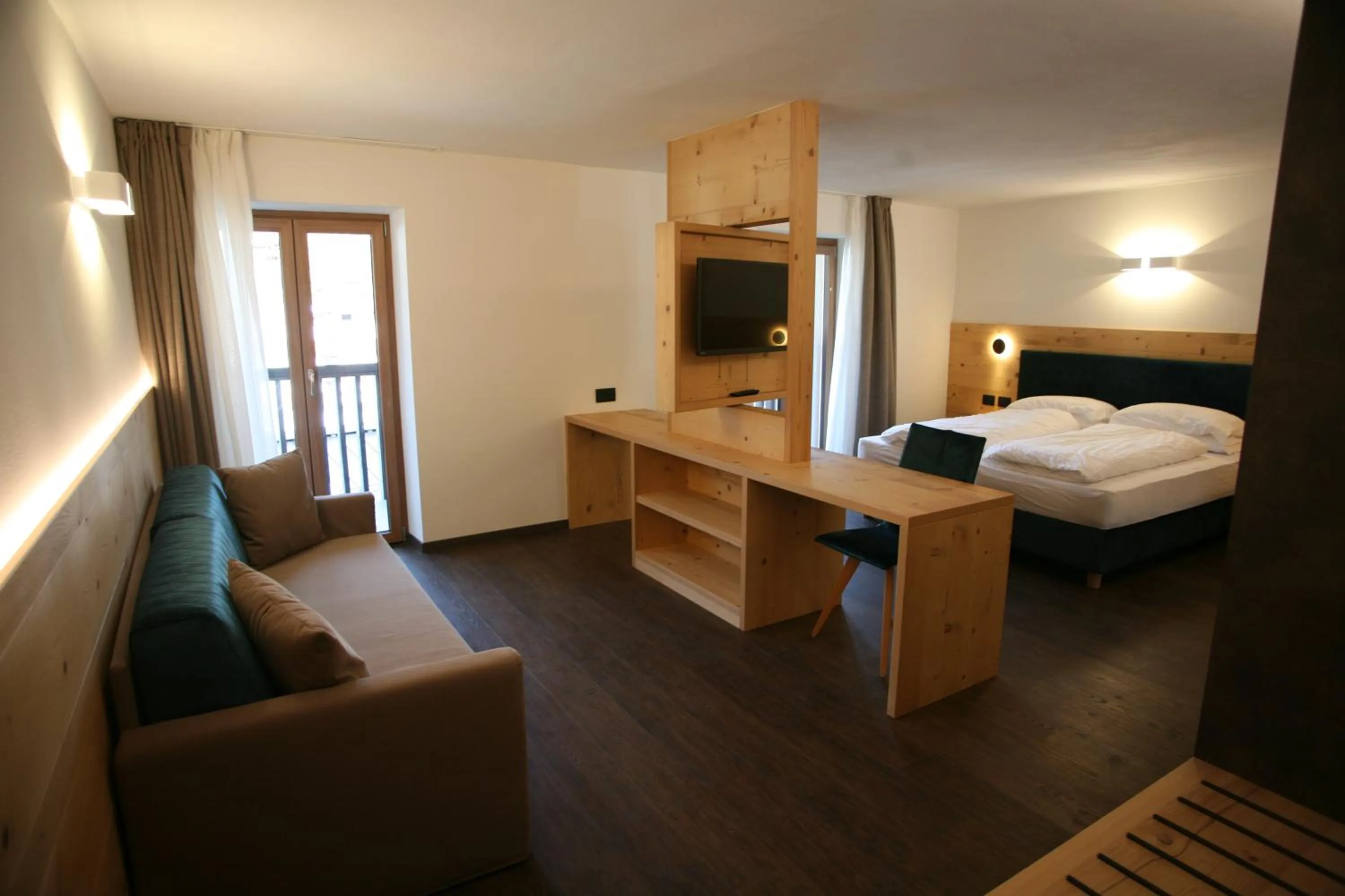 Bed in Alpen Hotel Vidi