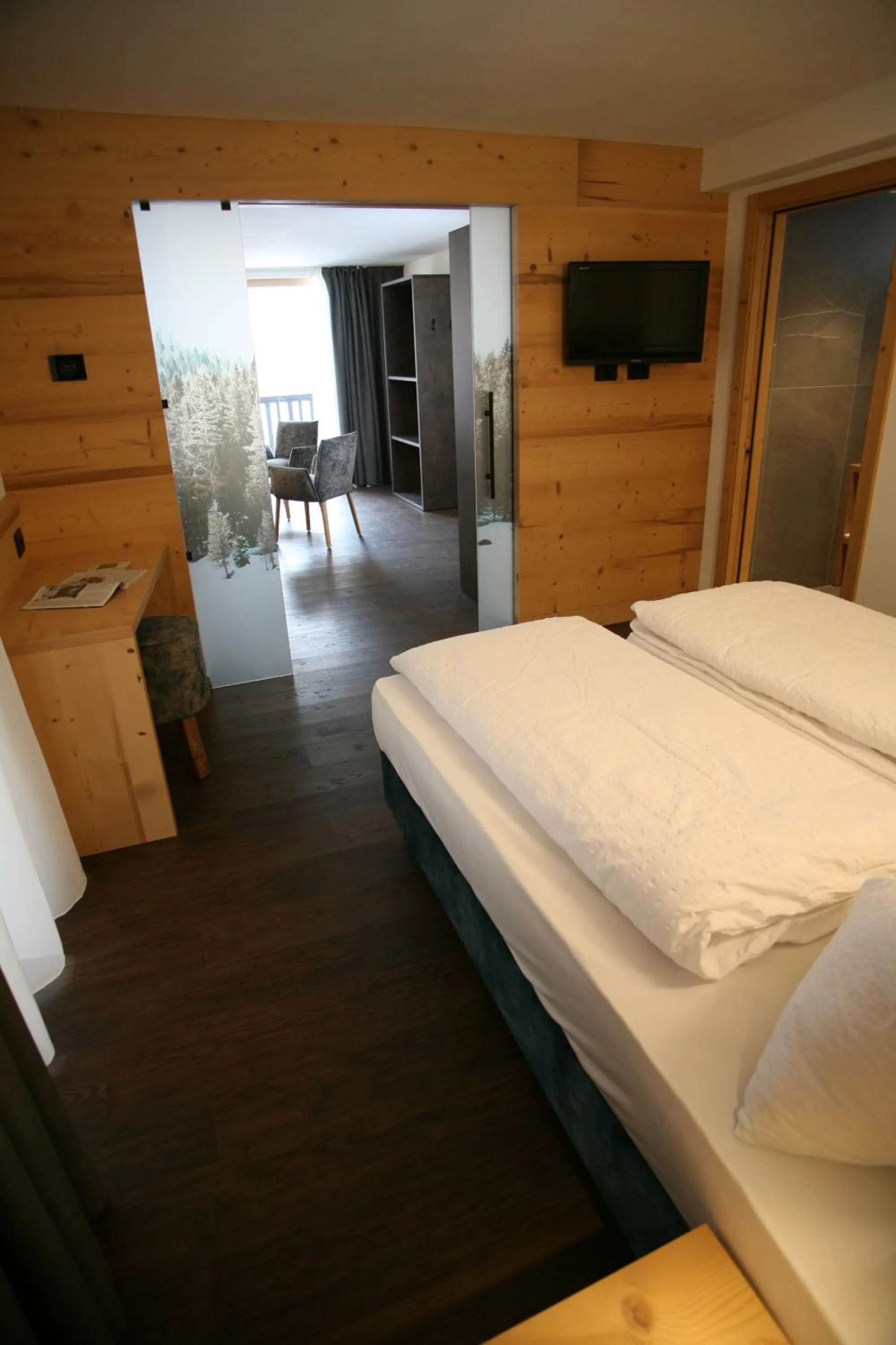 Bed in Alpen Hotel Vidi
