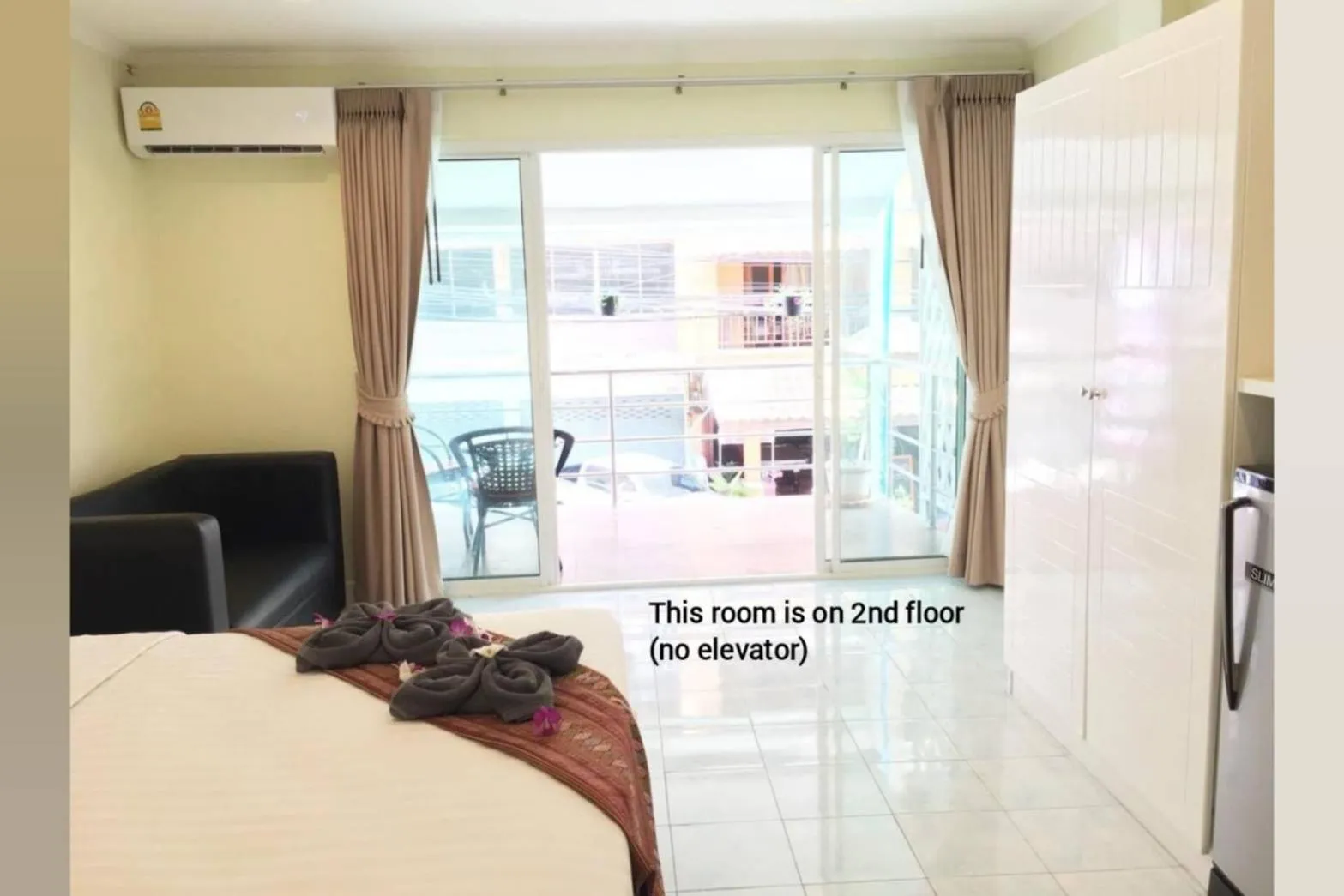 Bed in Thai Orchid Guest House