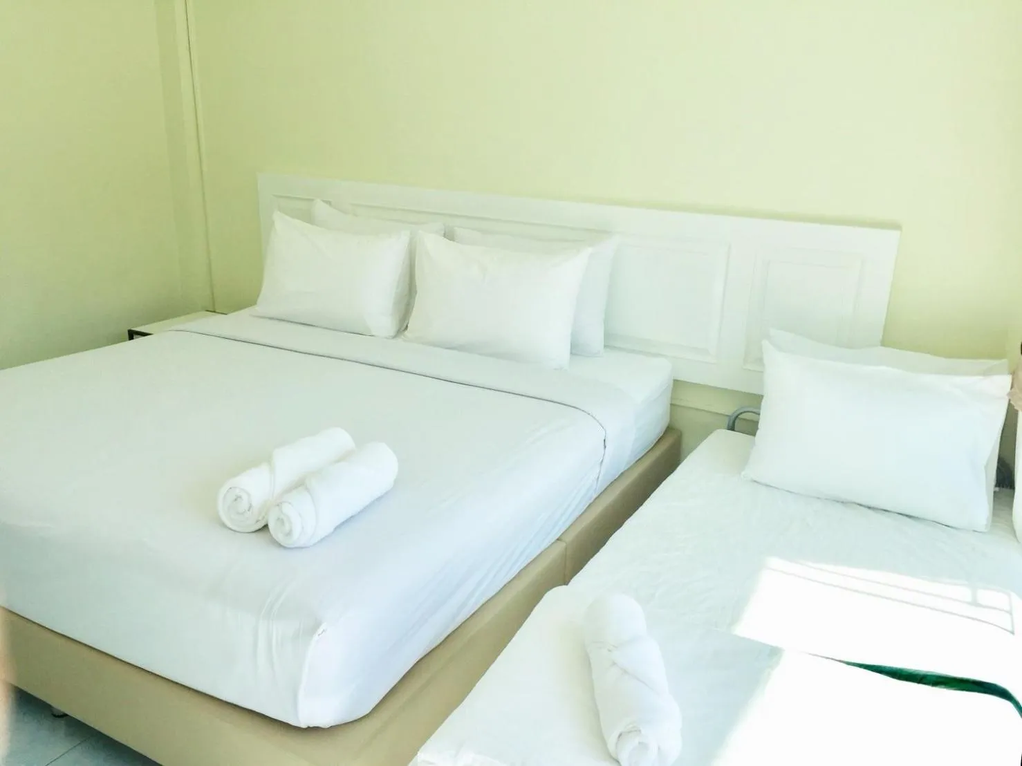 Bed in Thai Orchid Guest House