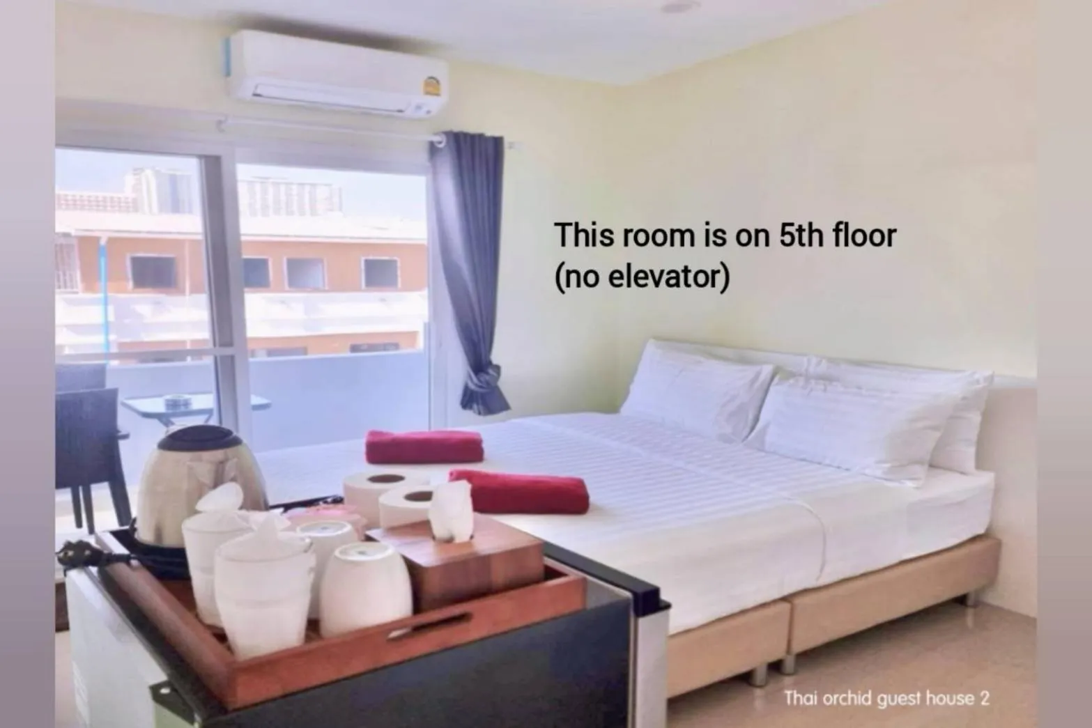 Bed in Thai Orchid Guest House