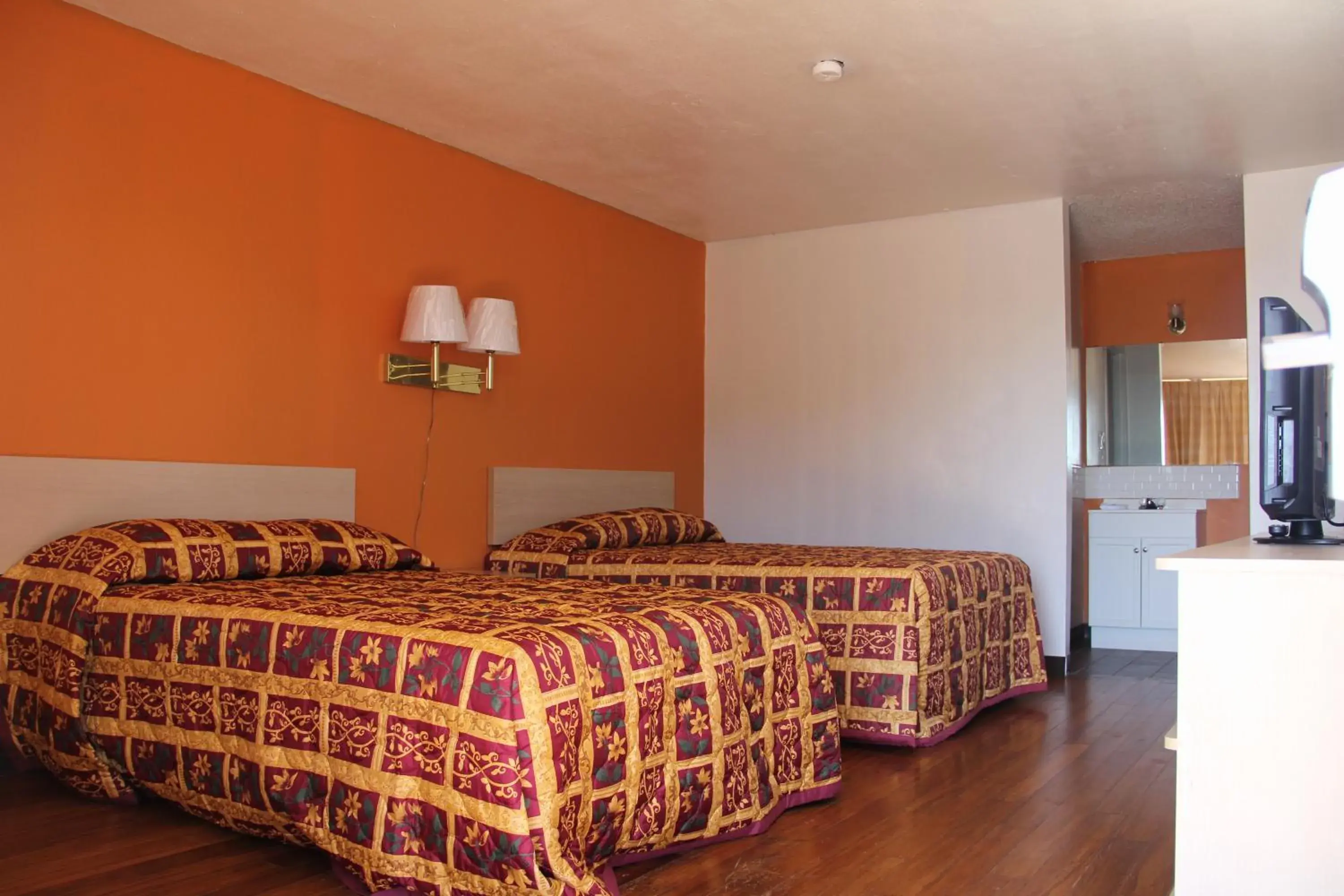 Bed in LoneStar Inn and Suites Bed in LoneStar Inn and Suites