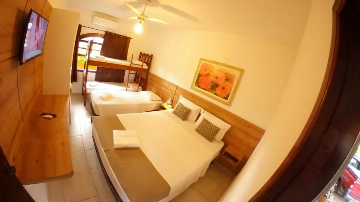 Bed in Hotel Pousada Paradise