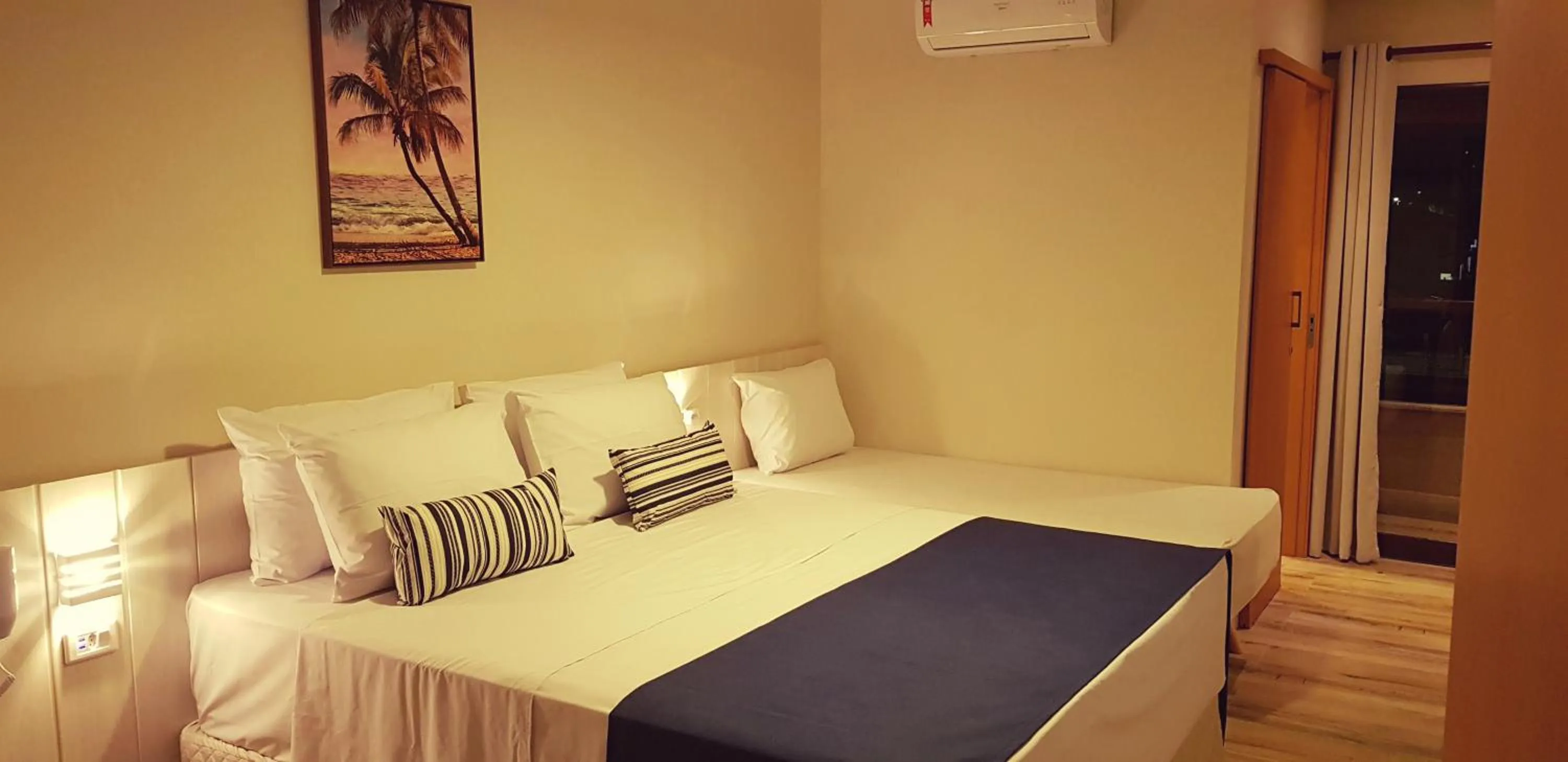 Bed in Hotel Pousada Paradise