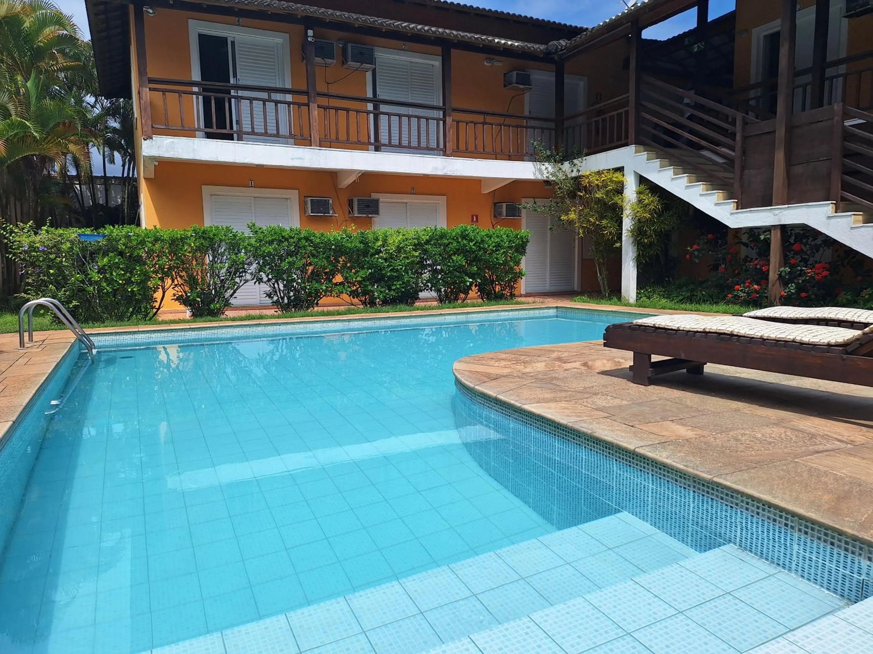 Swimming pool in Pousada Rosa dos Ventos Juquehy