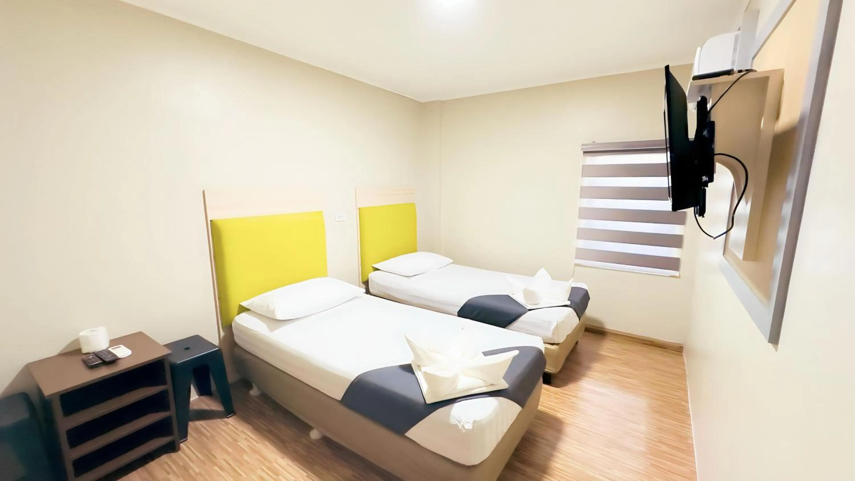 Bed in DG Budget Hotel Salem