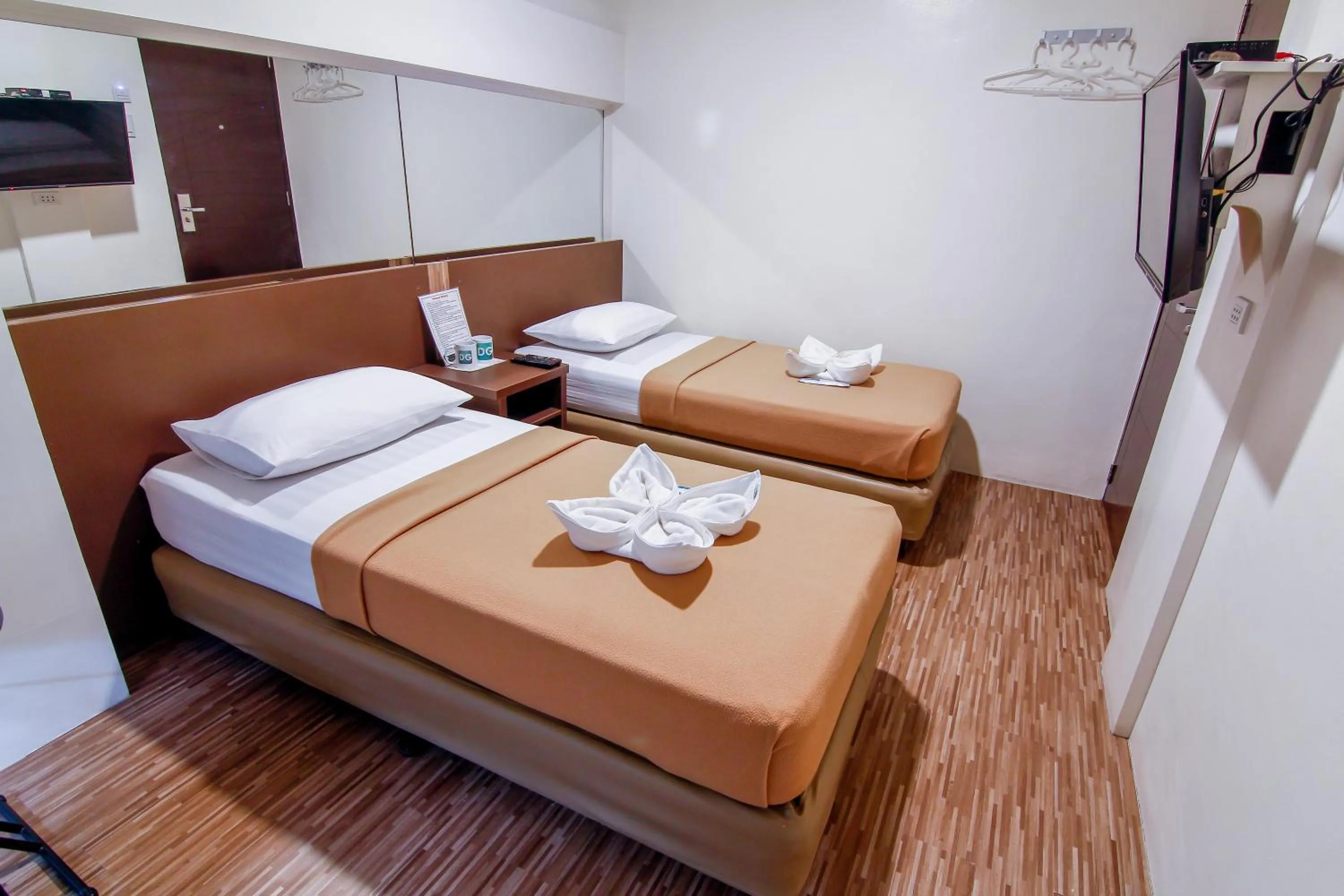 Bed in DG Budget Hotel Salem