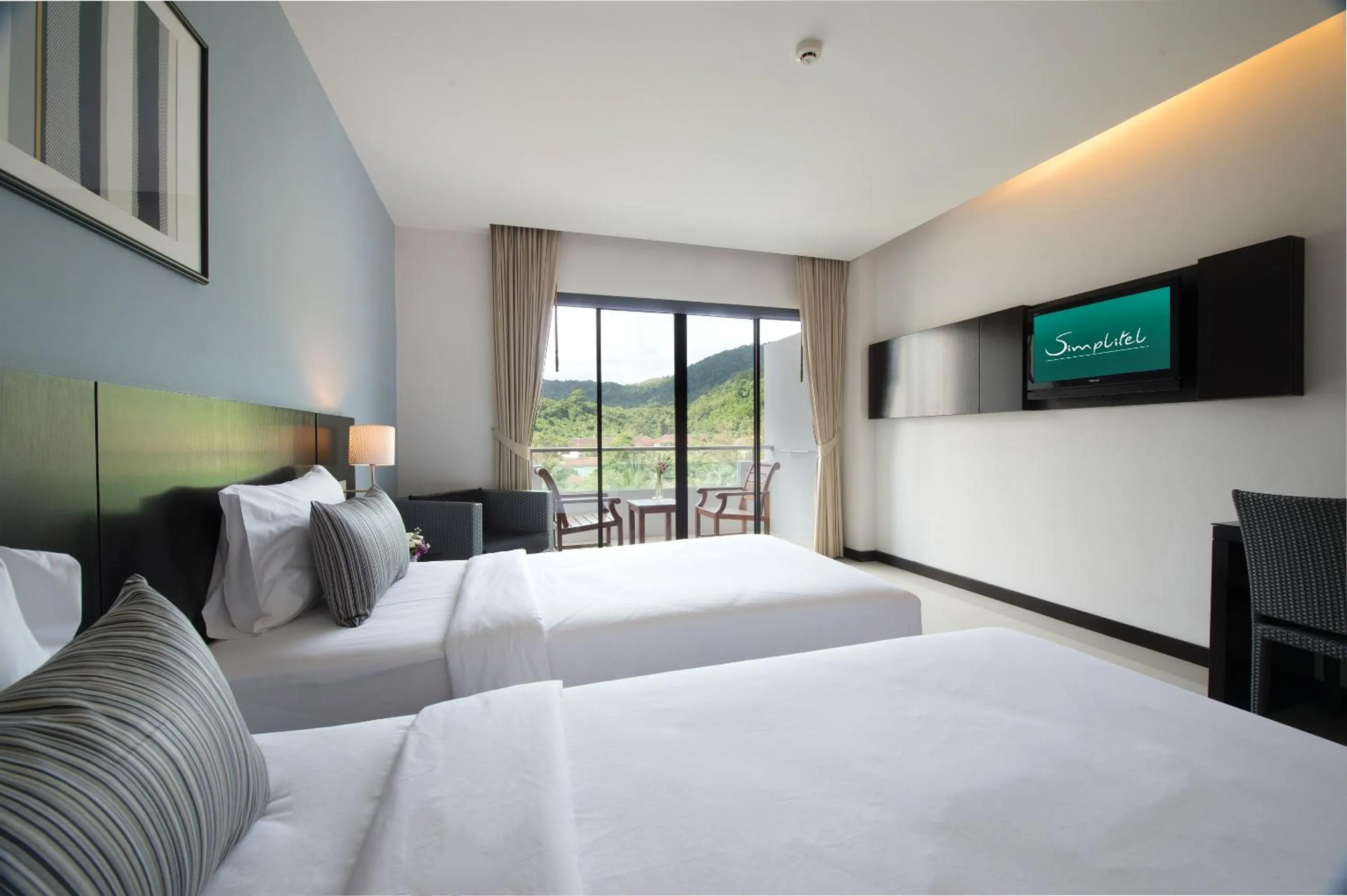 Photo of the whole room, Bed in Simplitel