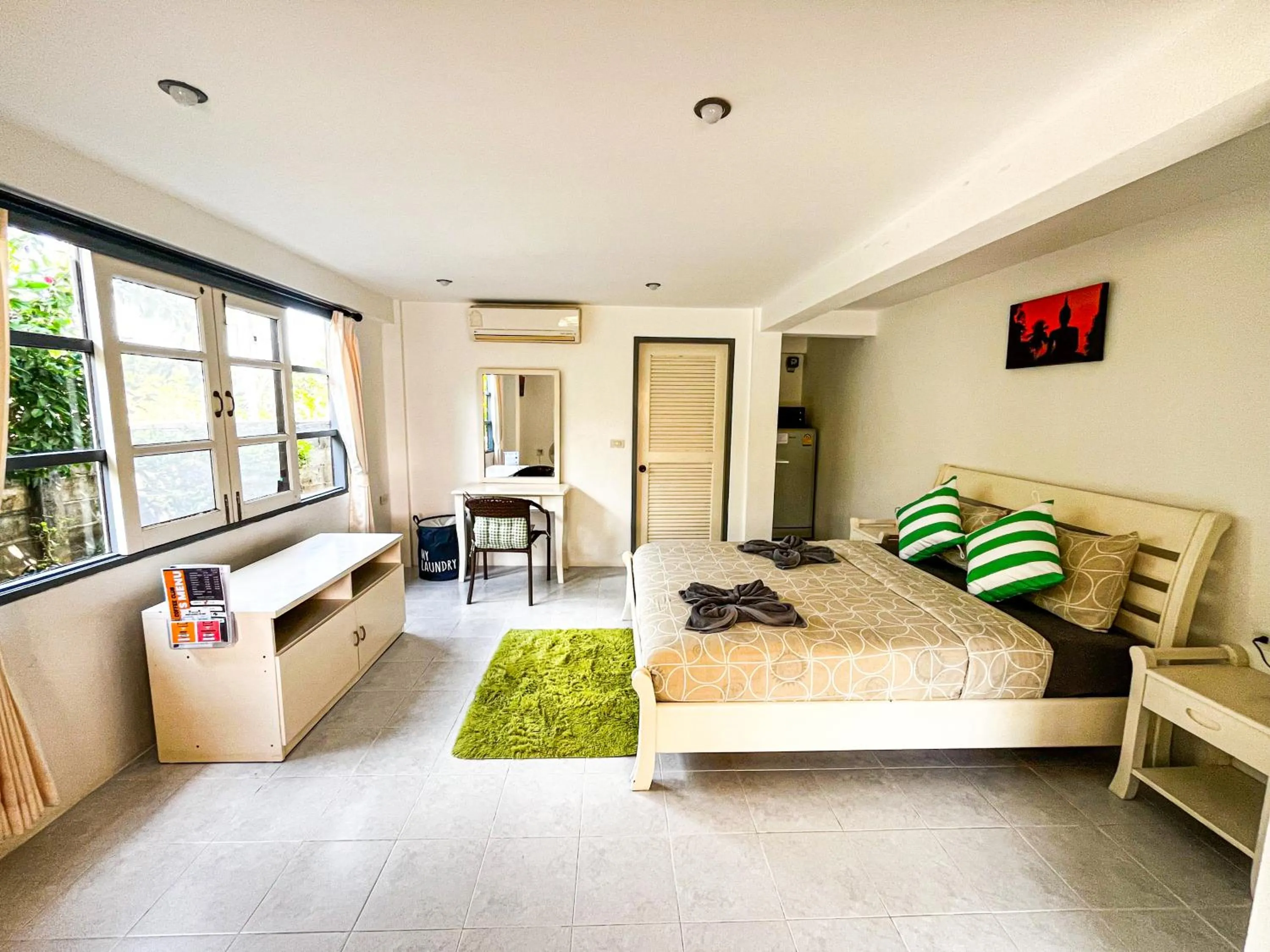 Bed in Amy Village Apartments & Digital Hub