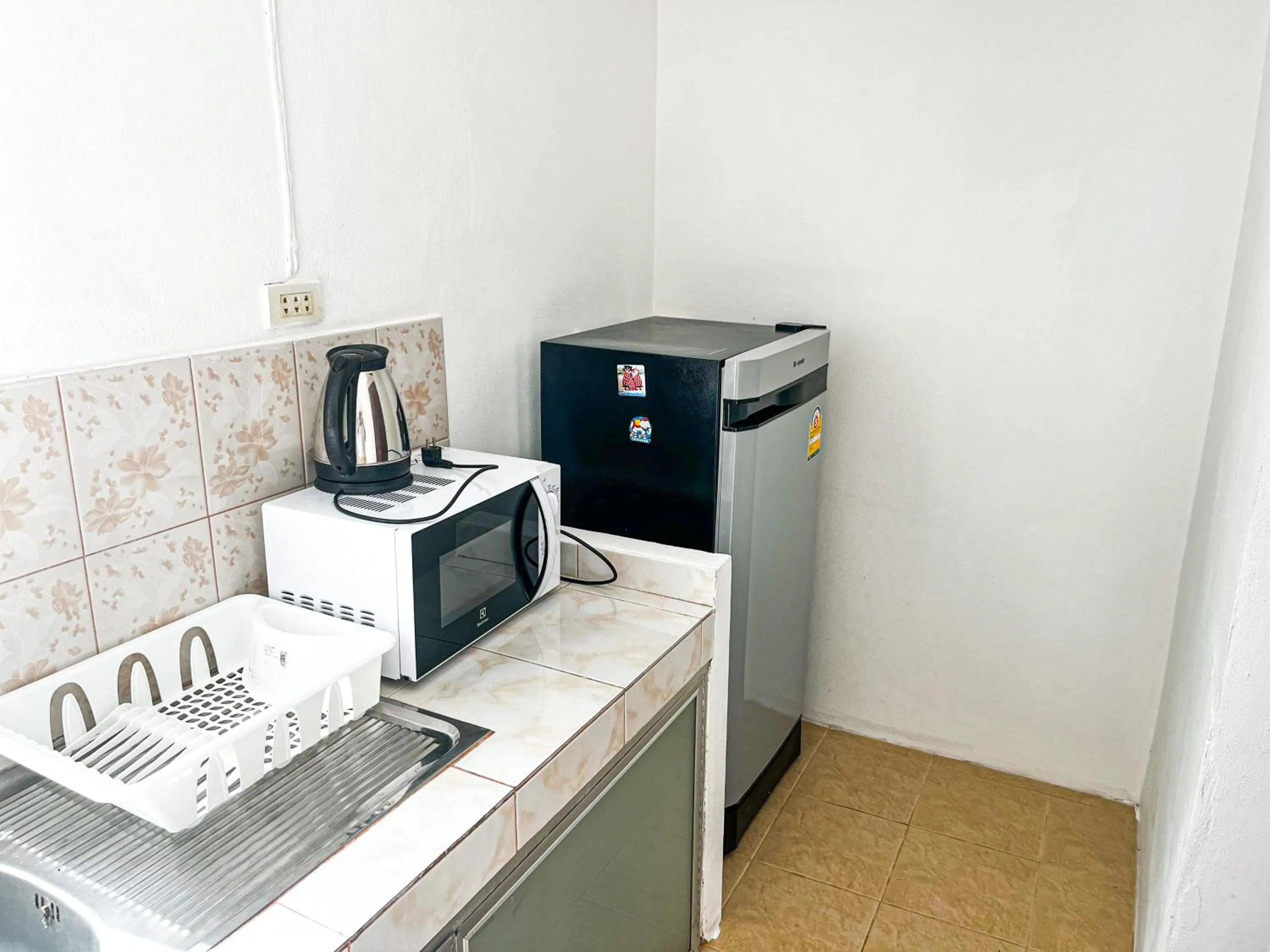 Kitchen or kitchenette in Amy Village Apartments & Digital Hub