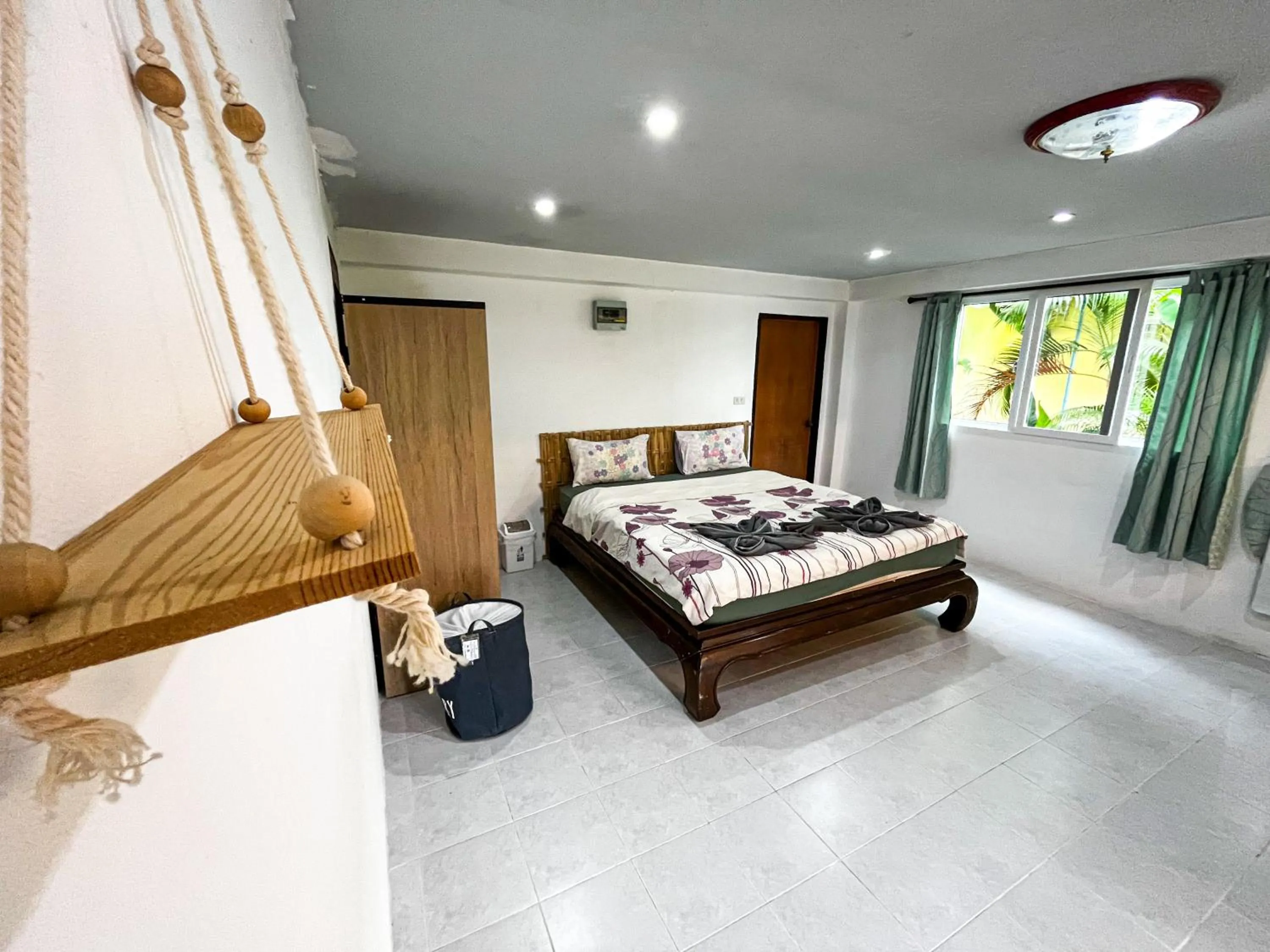 Bed in Amy Village Apartments & Digital Hub