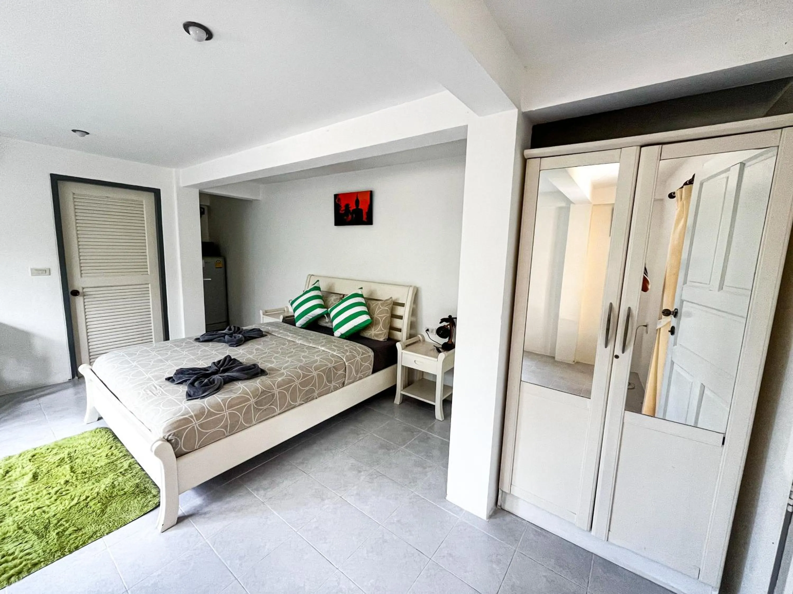 Bed in Amy Village Apartments & Digital Hub