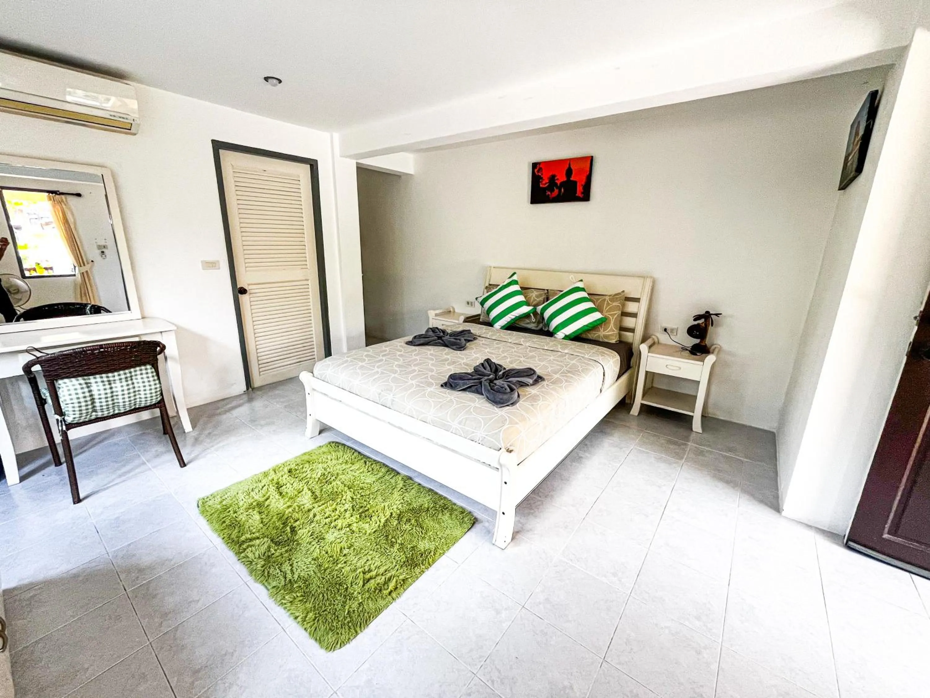 Bed in Amy Village Apartments & Digital Hub