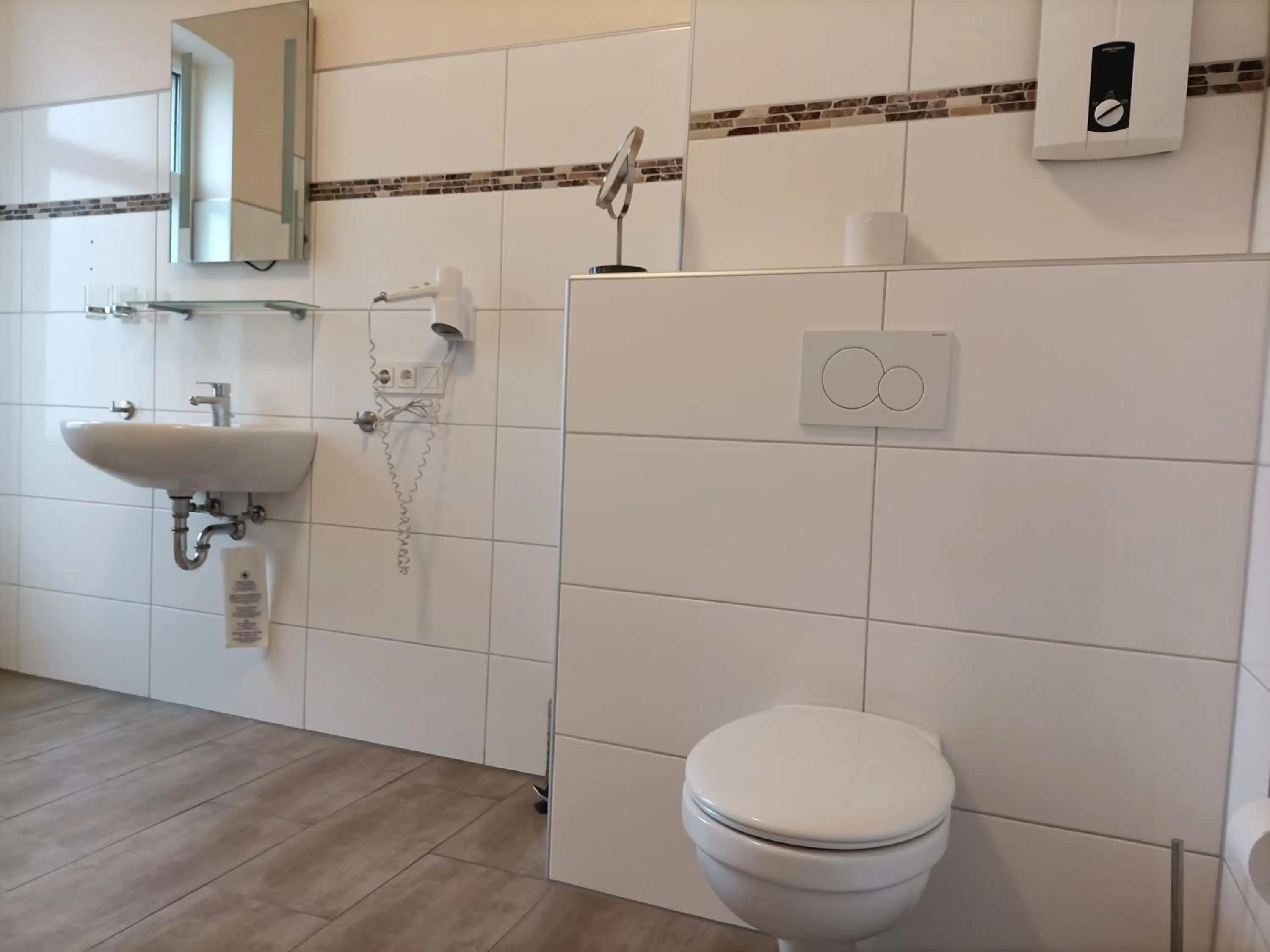 Toilet in Hotel An der Karlstadt