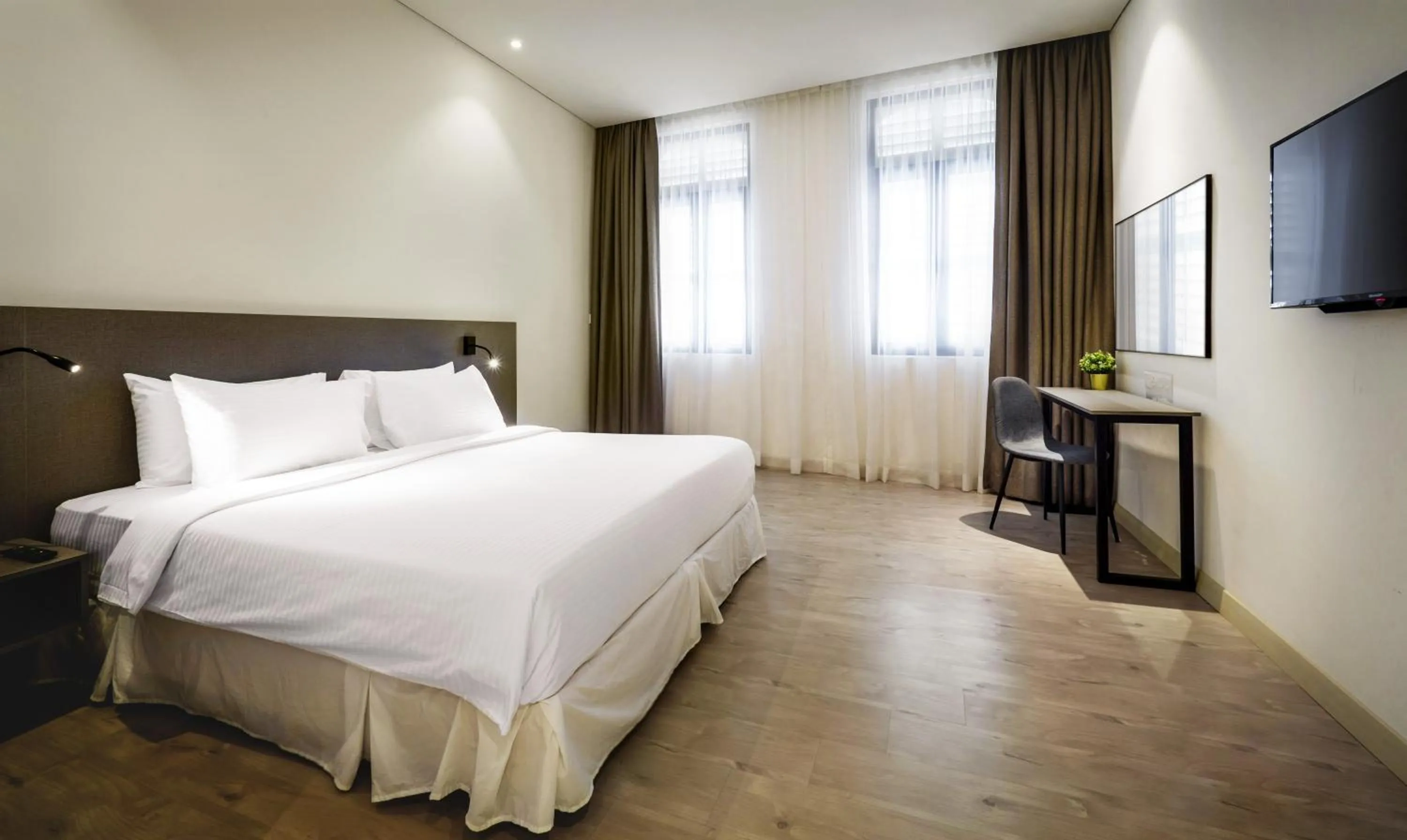 Bed in Magazine Vista Hotel Managed by The Ascott Limited