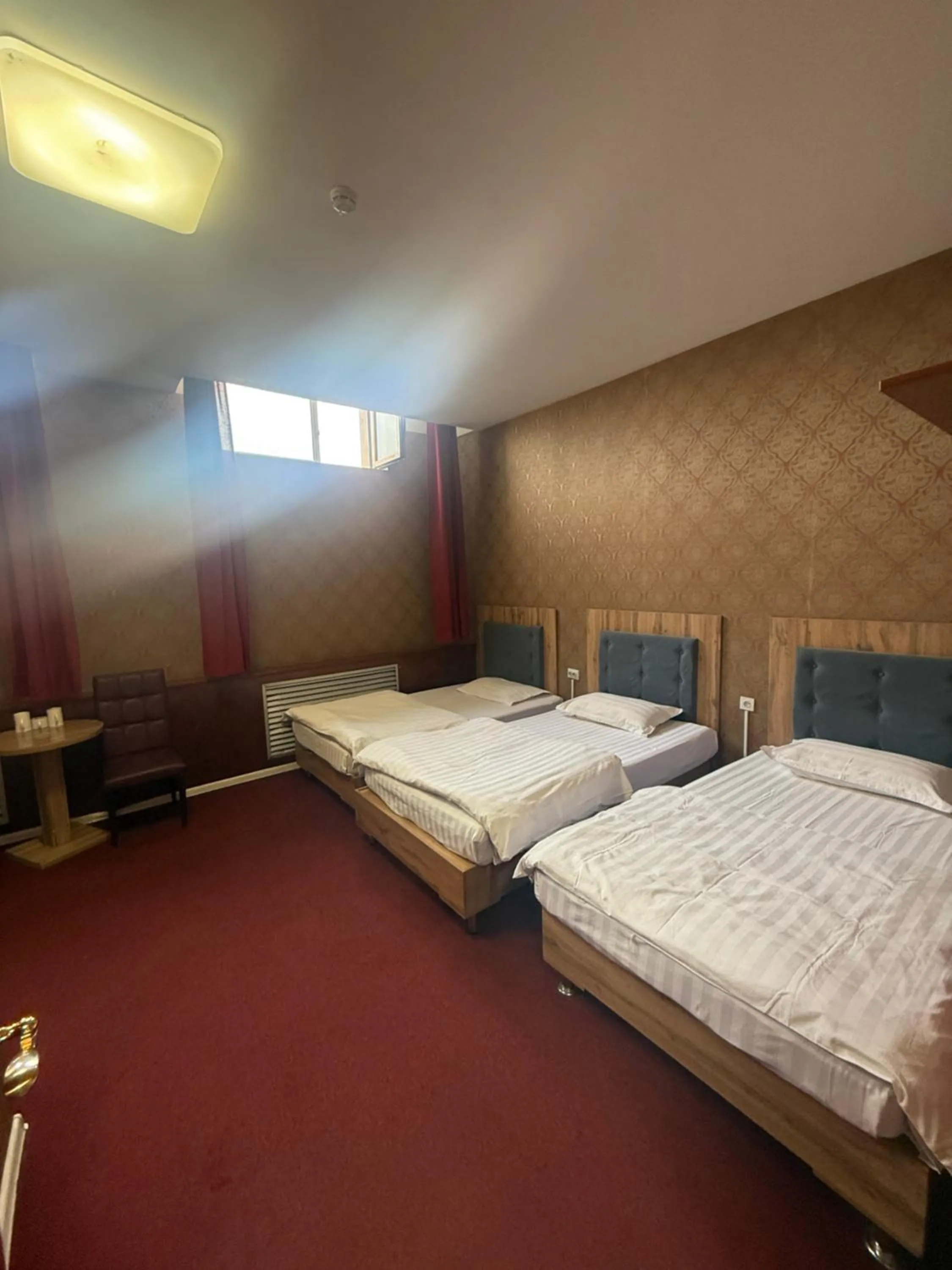 Budget Triple Room in Zolotoi Drakon Hotel