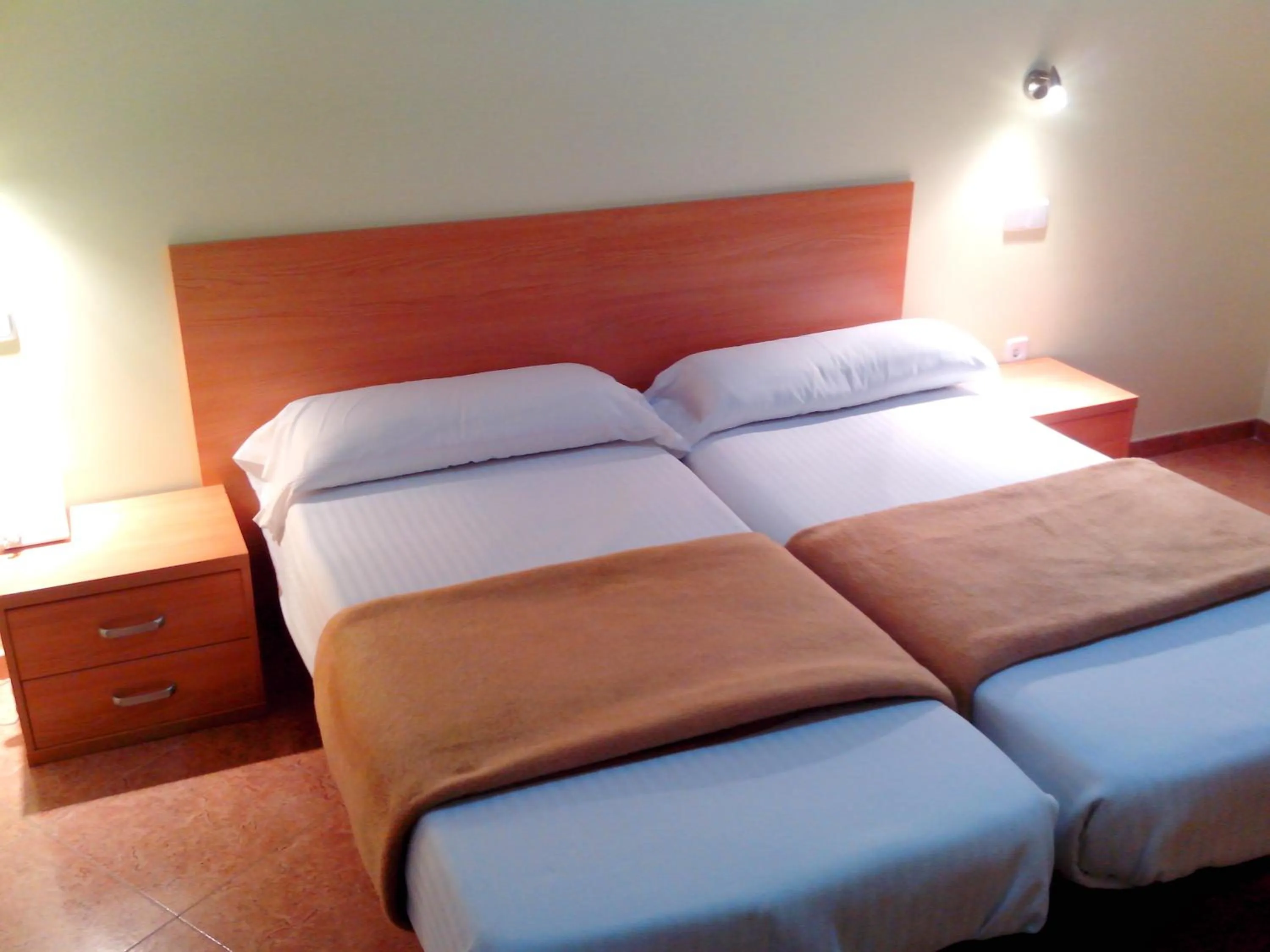 Bed in Hotel RC Ramon y Cajal