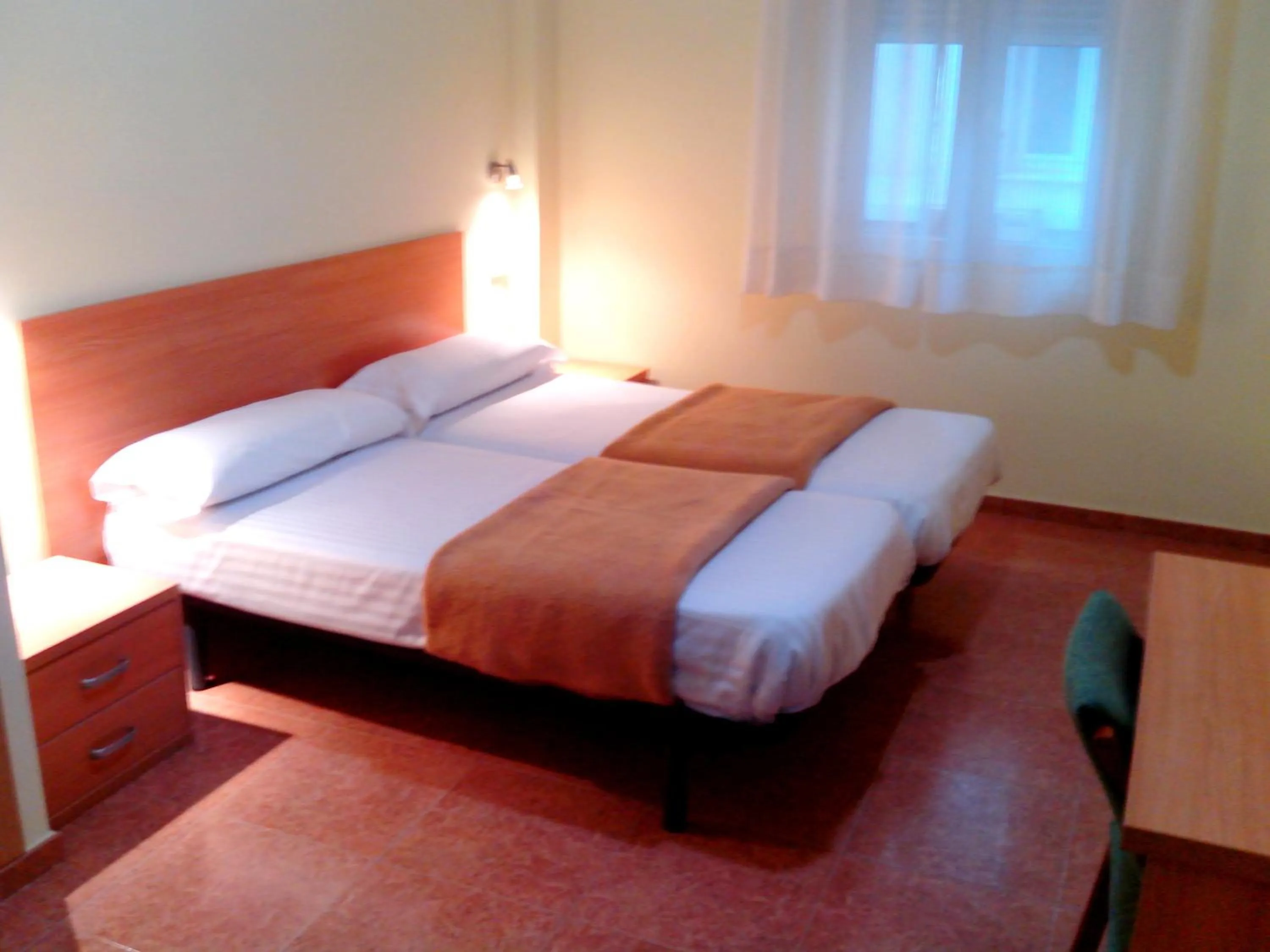 Photo of the whole room, Bed in Hotel RC Ramon y Cajal