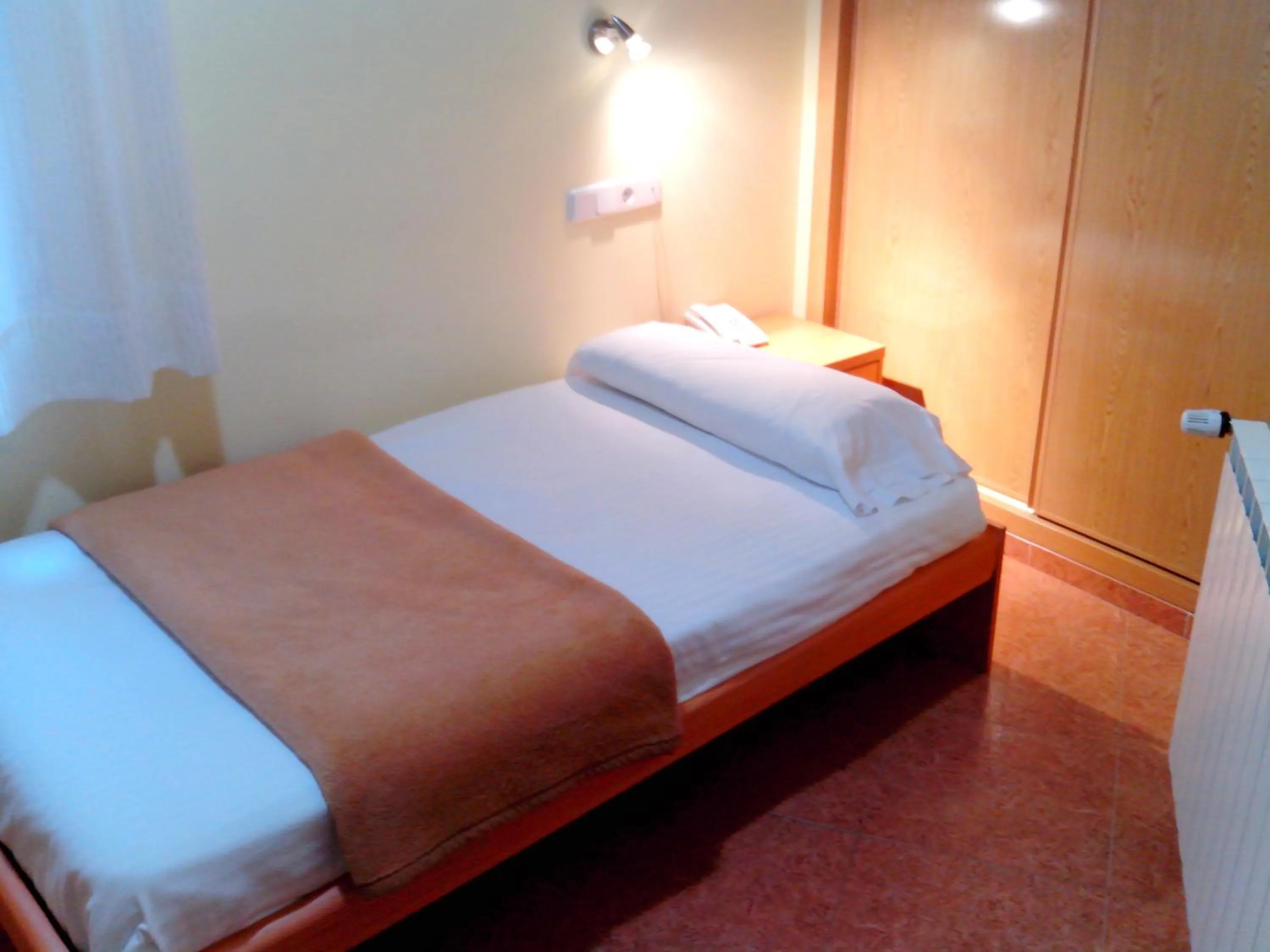 Bed in Hotel RC Ramon y Cajal