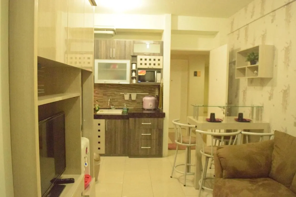 Kitchen or kitchenette in Pakubuwono Terrace Apartment