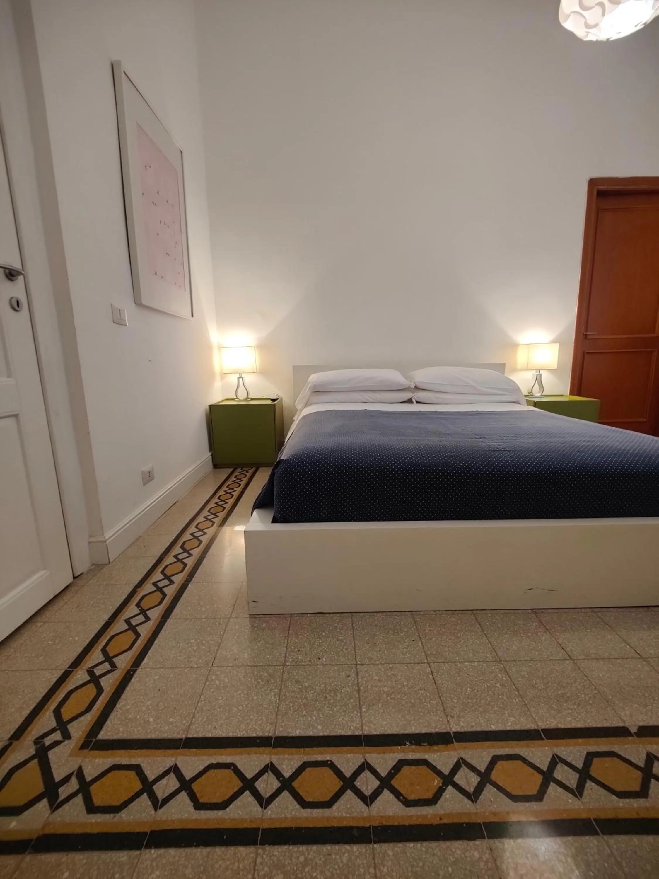 Bed in AcB Vaticano Suites