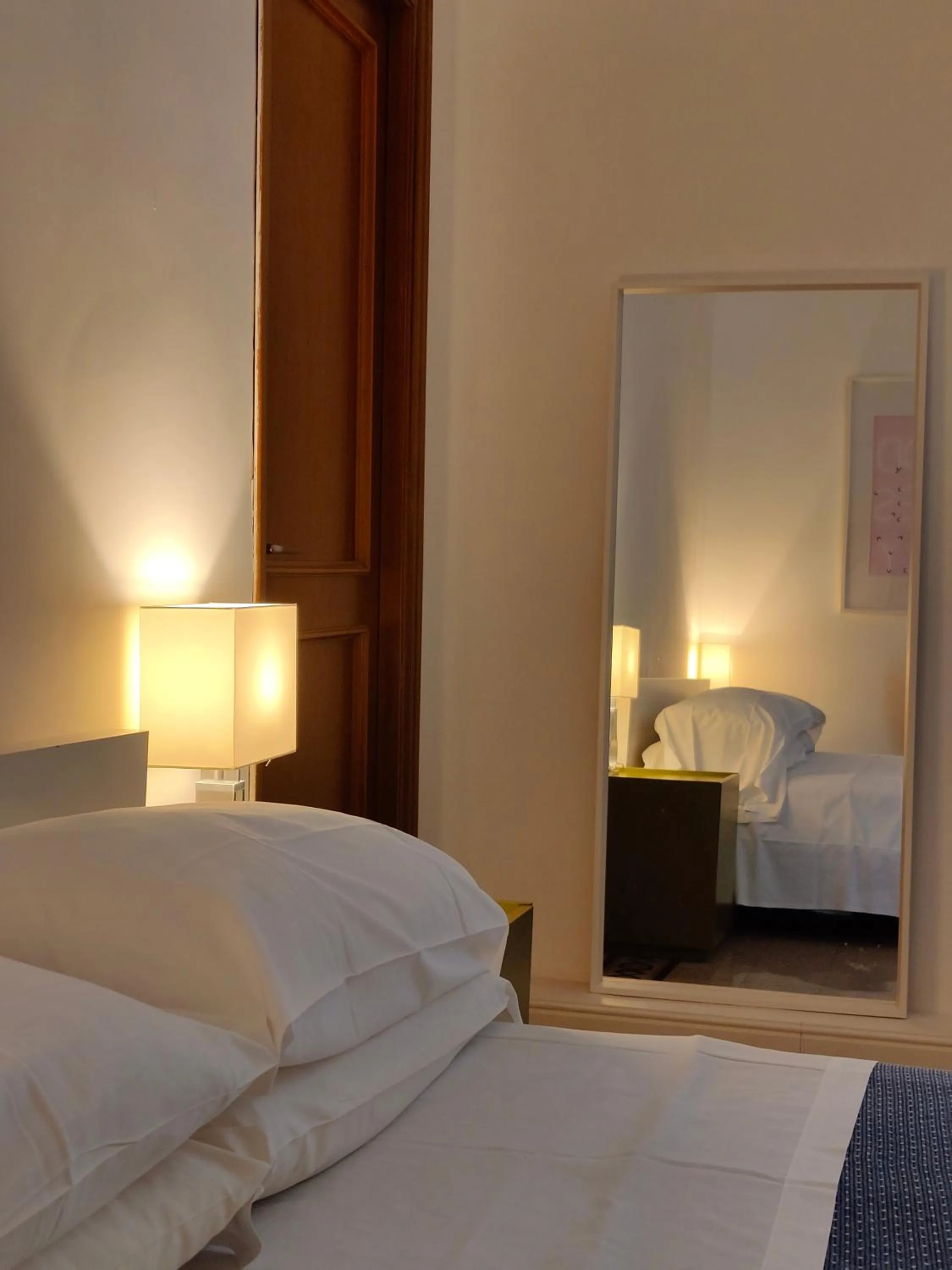 Bed in AcB Vaticano Suites
