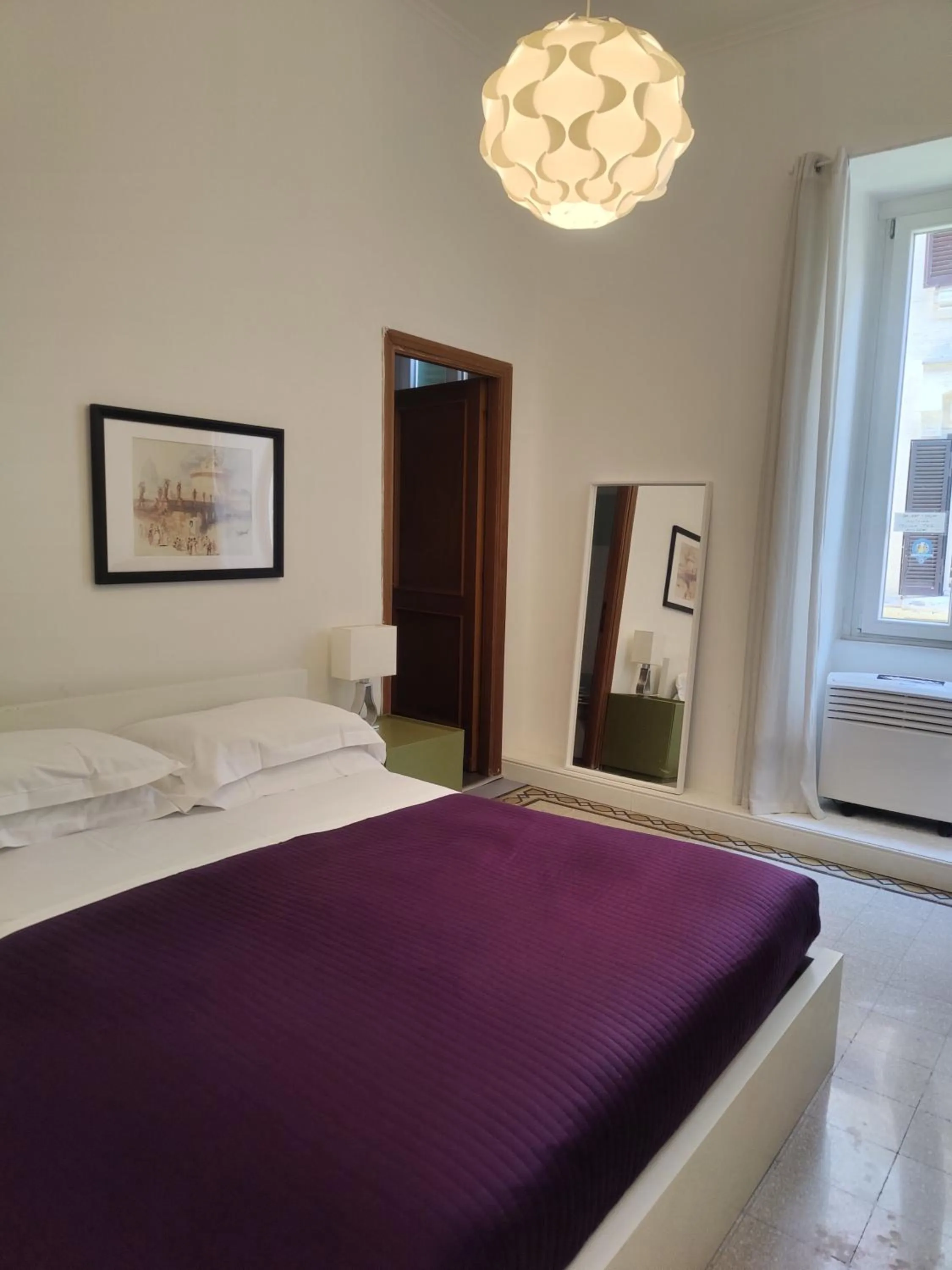 Bed in AcB Vaticano Suites