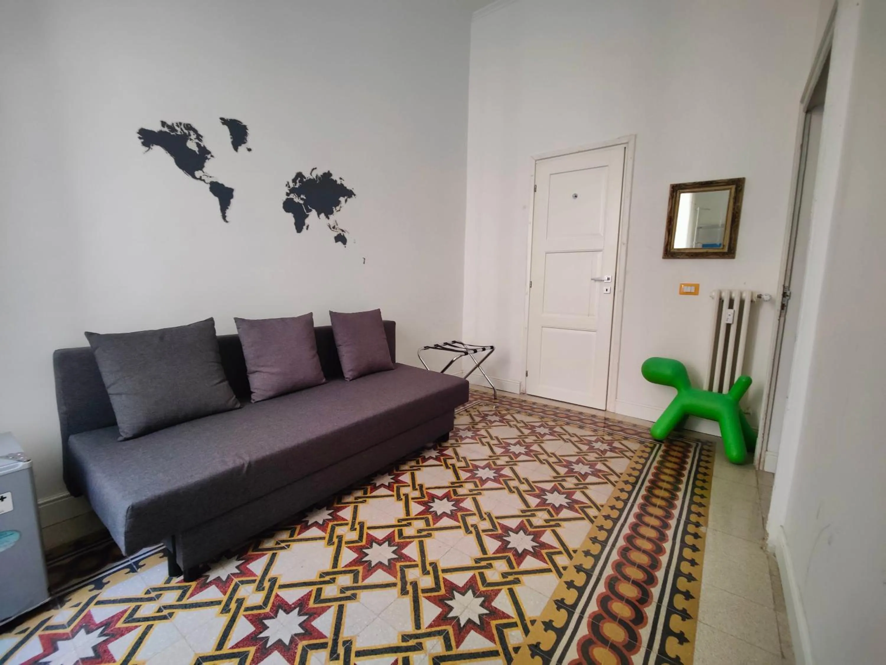 Seating area in AcB Vaticano Suites