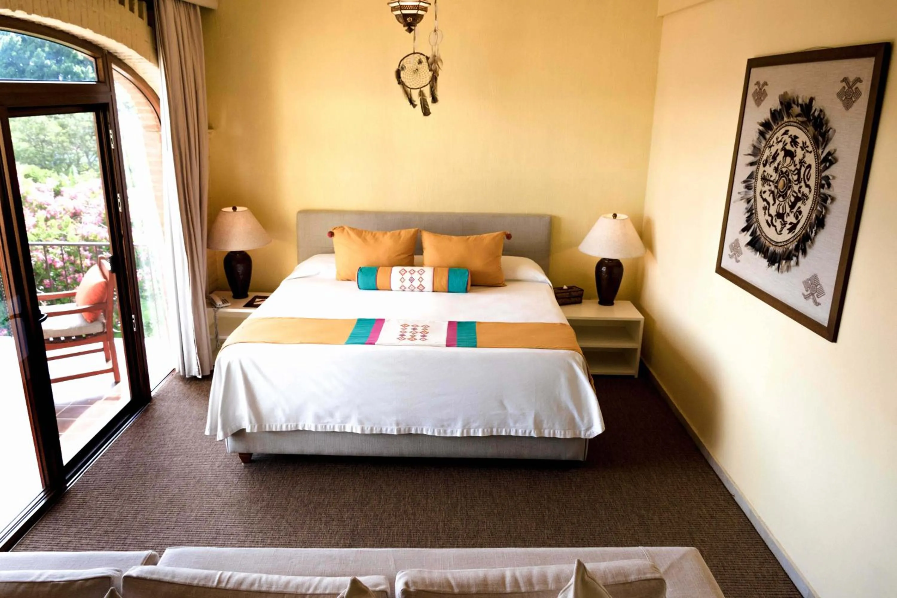 Bed in El Chante Spa Hotel