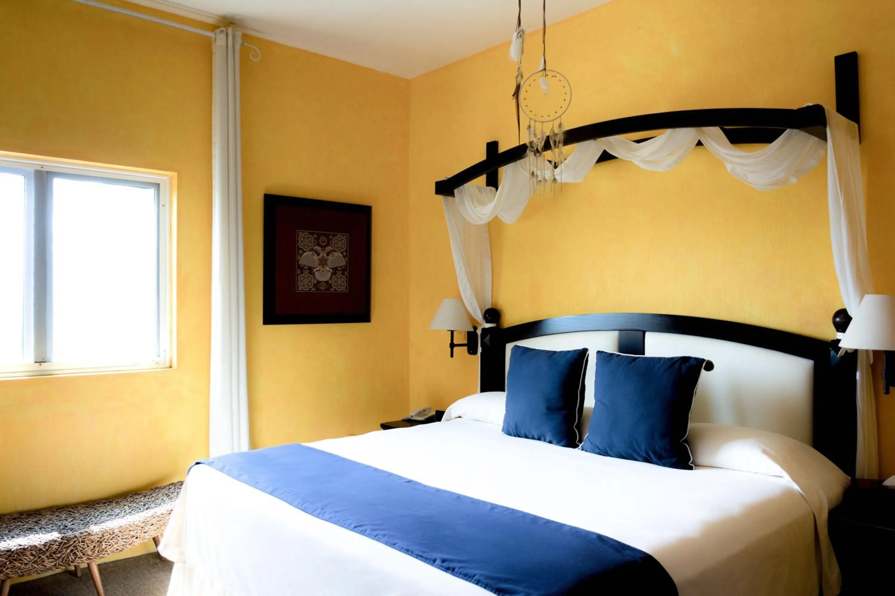 Bed in El Chante Spa Hotel