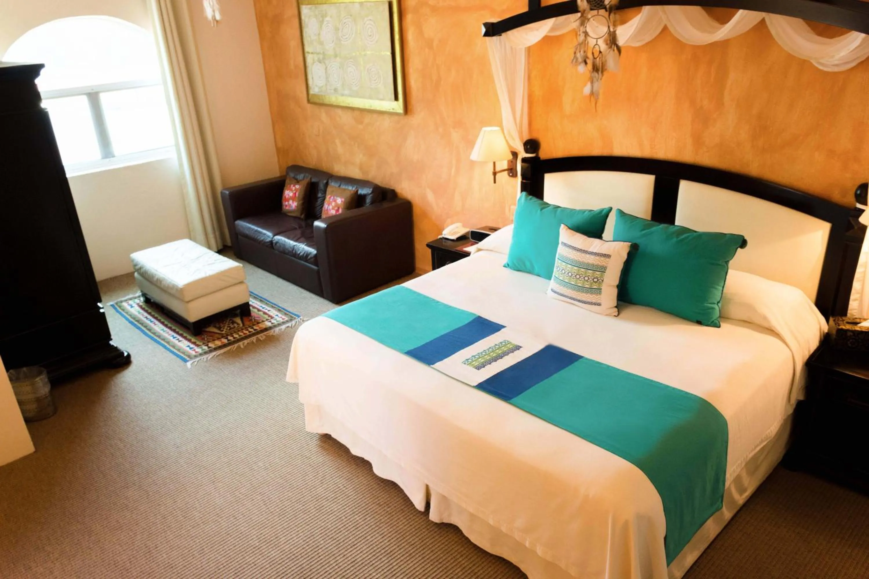 Bed in El Chante Spa Hotel