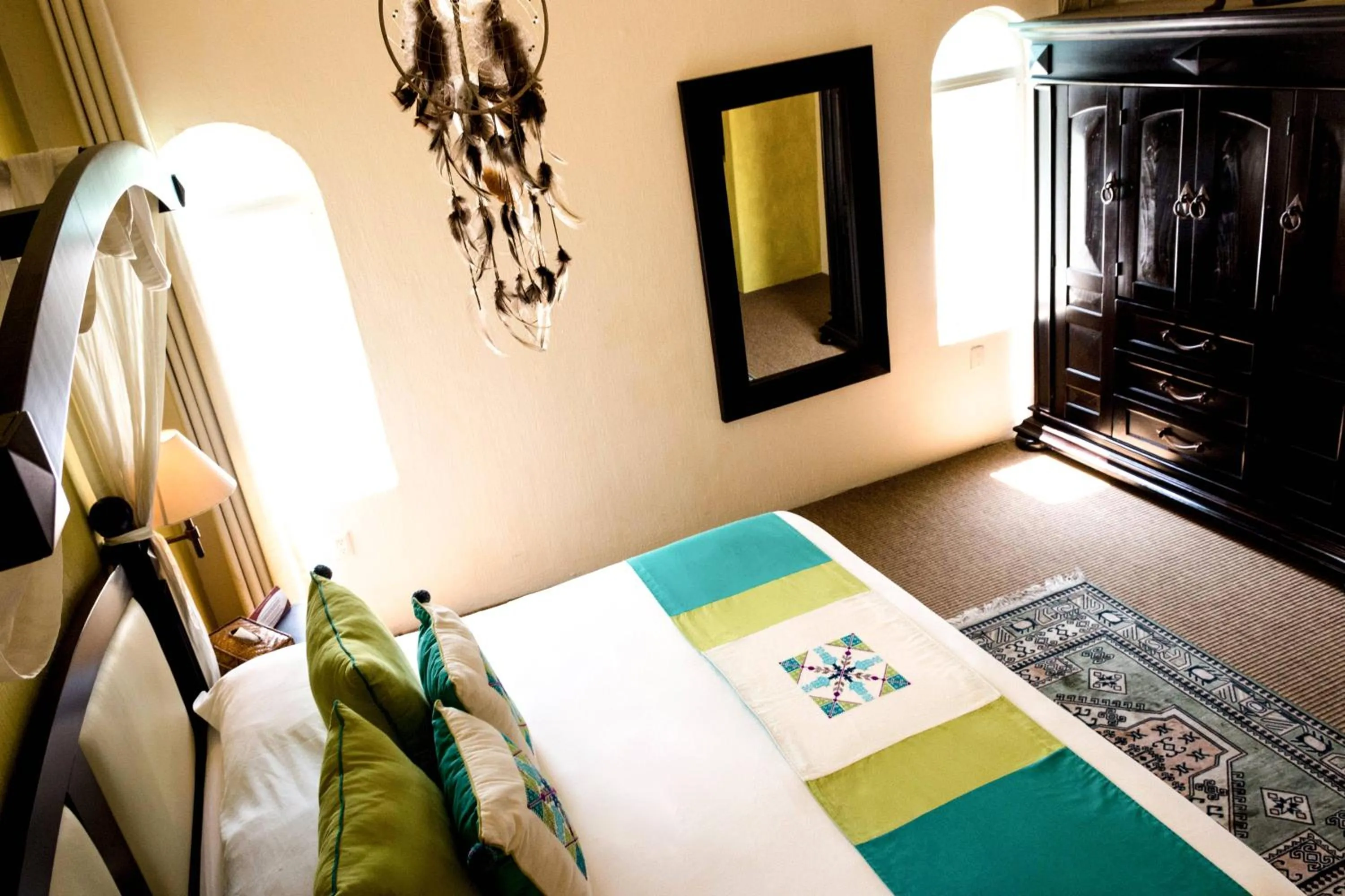 Bed in El Chante Spa Hotel