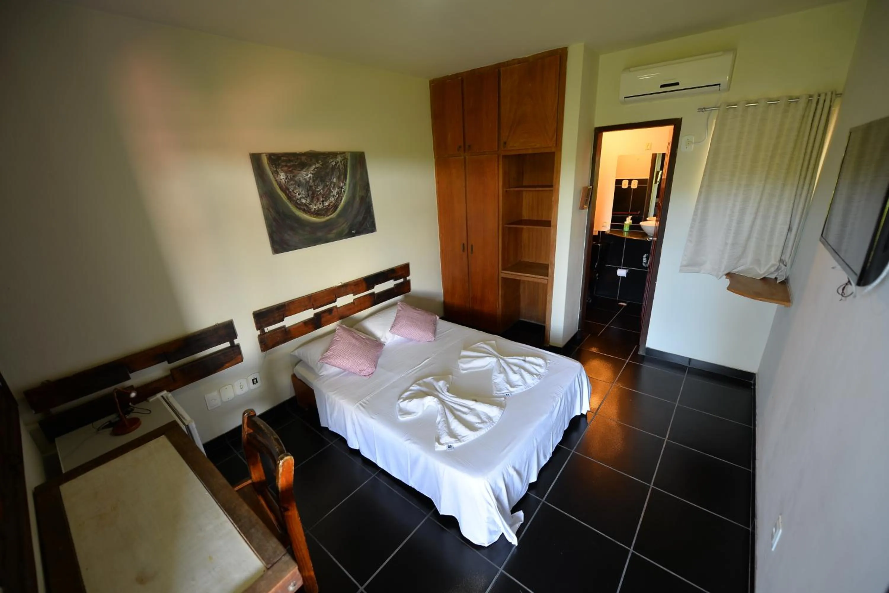 Bed in Pousada do Gunga