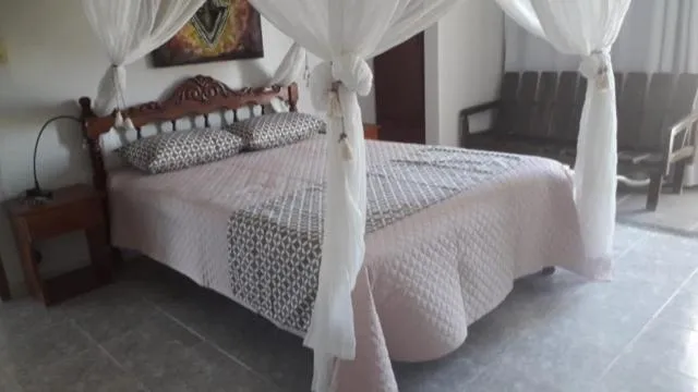 Bed in Pousada do Gunga