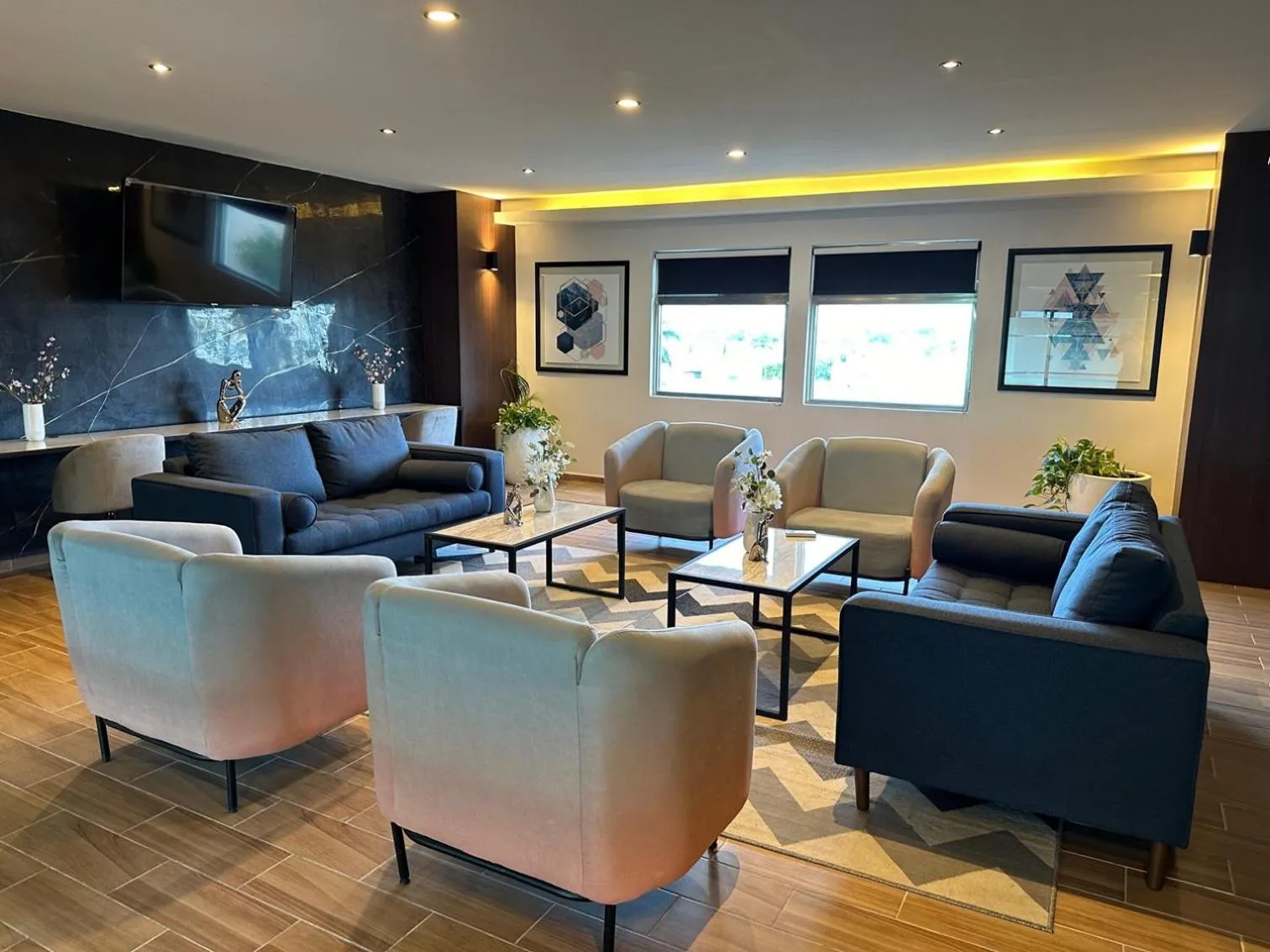 Communal lounge/ TV room in Mision Express Merida Altabrisa