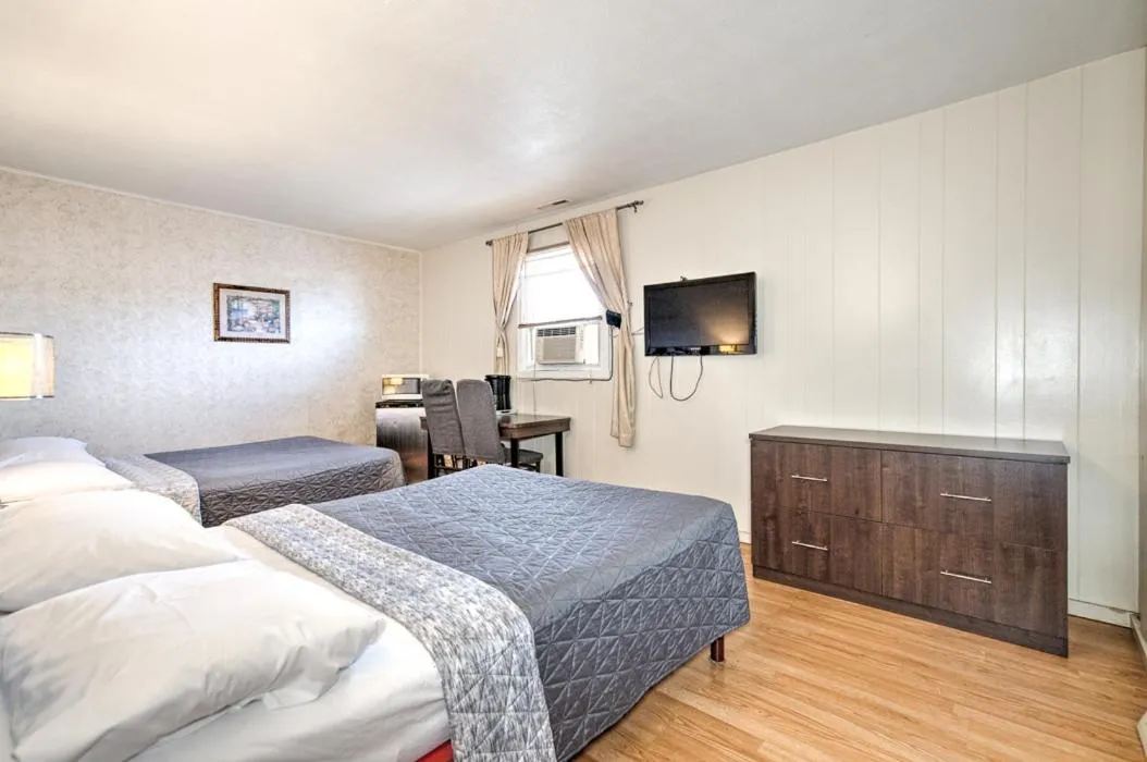 Bed in Motel Grande Ile