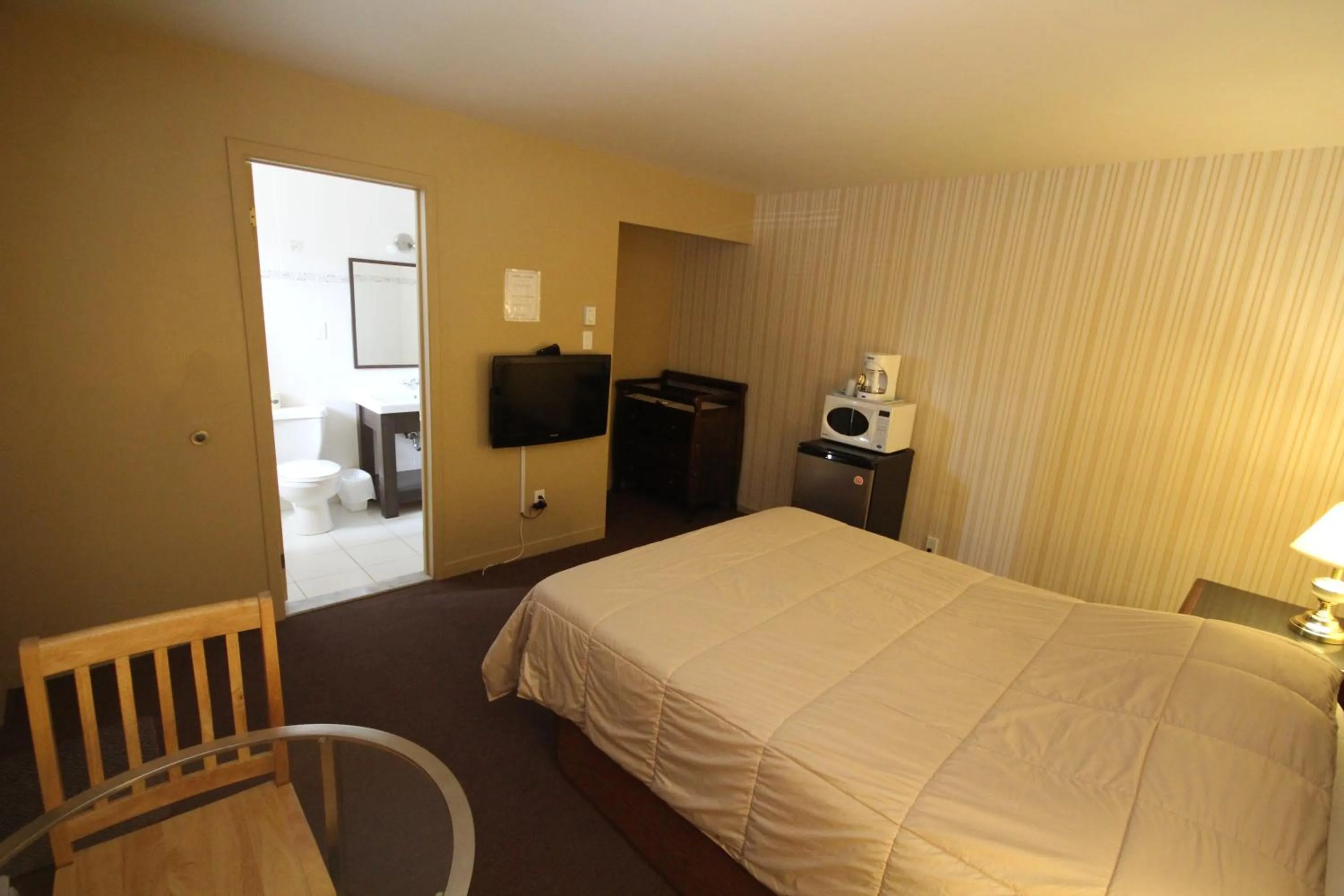 Bed in Motel Grande Ile