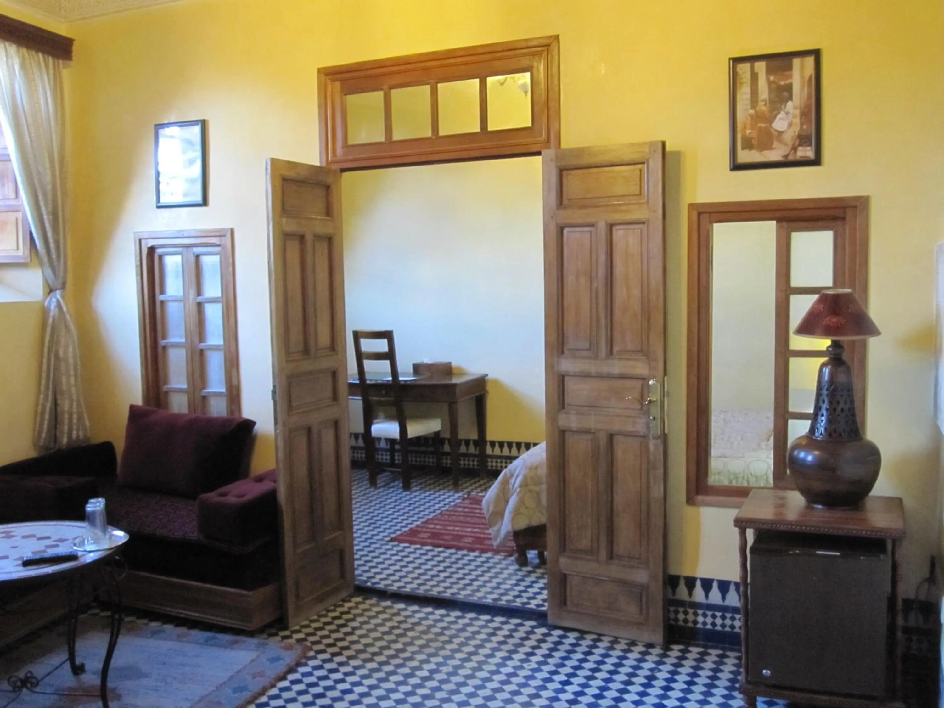 Living room, Bed in Riad Jaouhara