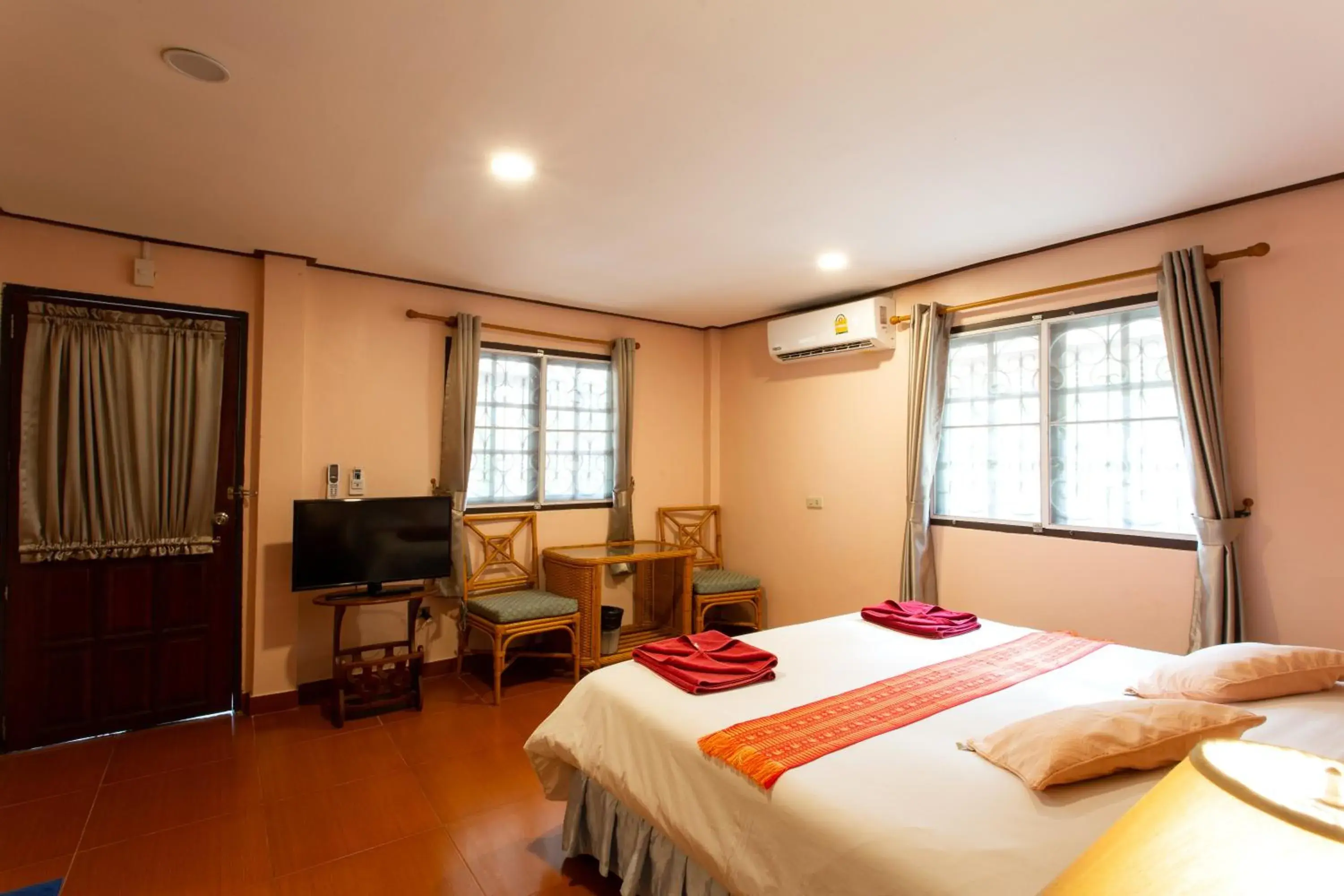 Bed in Harry's Bungalows Bed in Harry's Bungalows