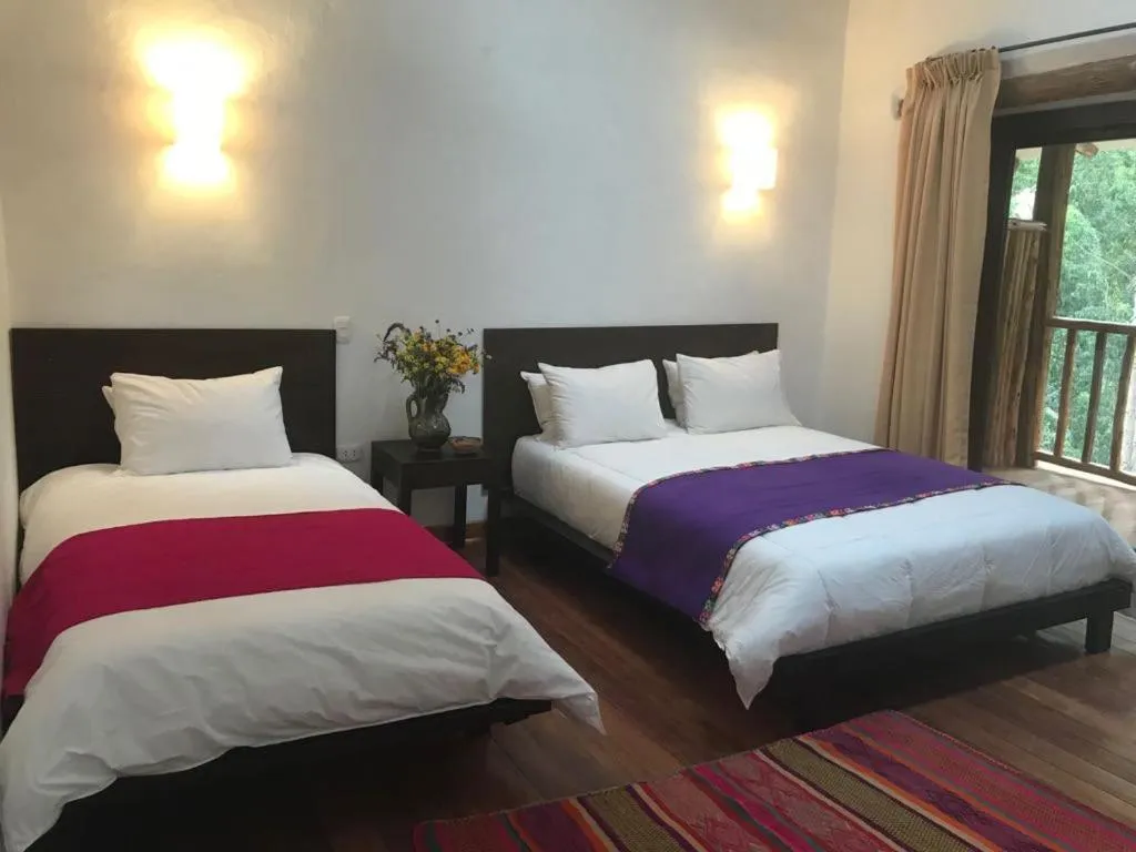 Photo of the whole room, Bed in Bamboo Lodge Sacred Valley