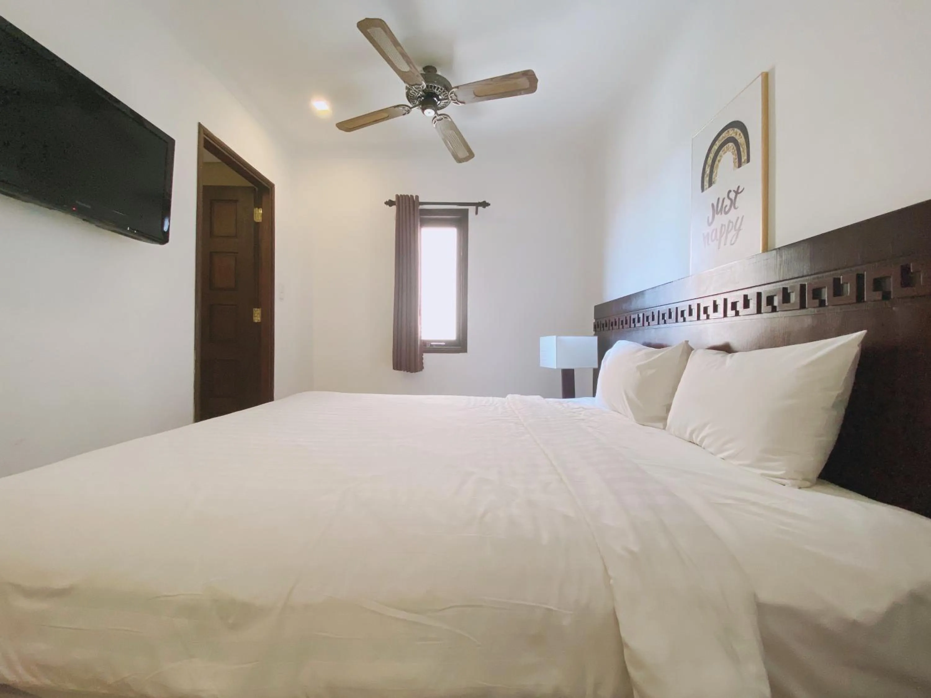 Bed in Zenta Sea View Hotel